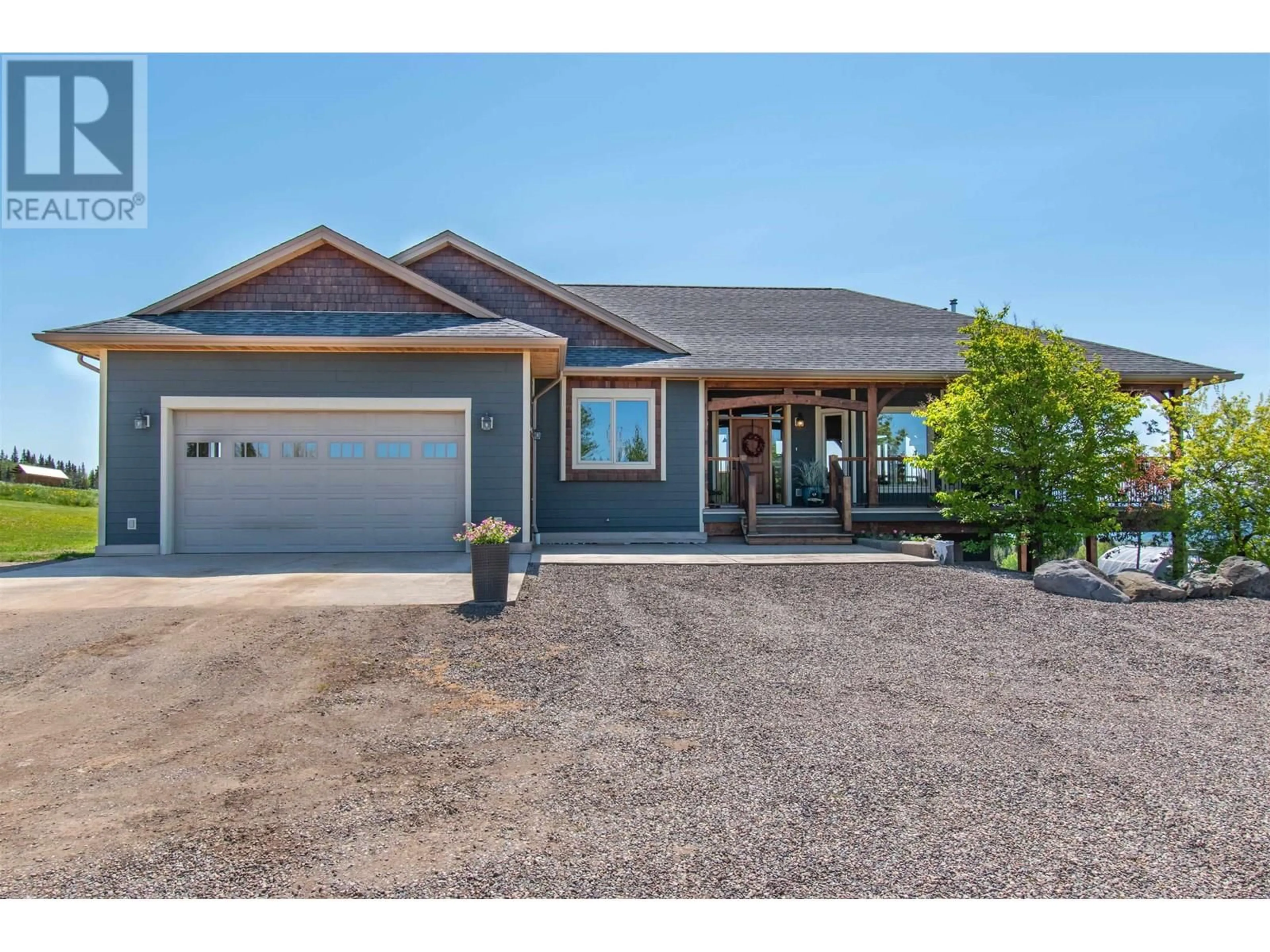 Home with vinyl exterior material, street for 6536 BOUNDARY ROAD, Telkwa British Columbia V0J2X2