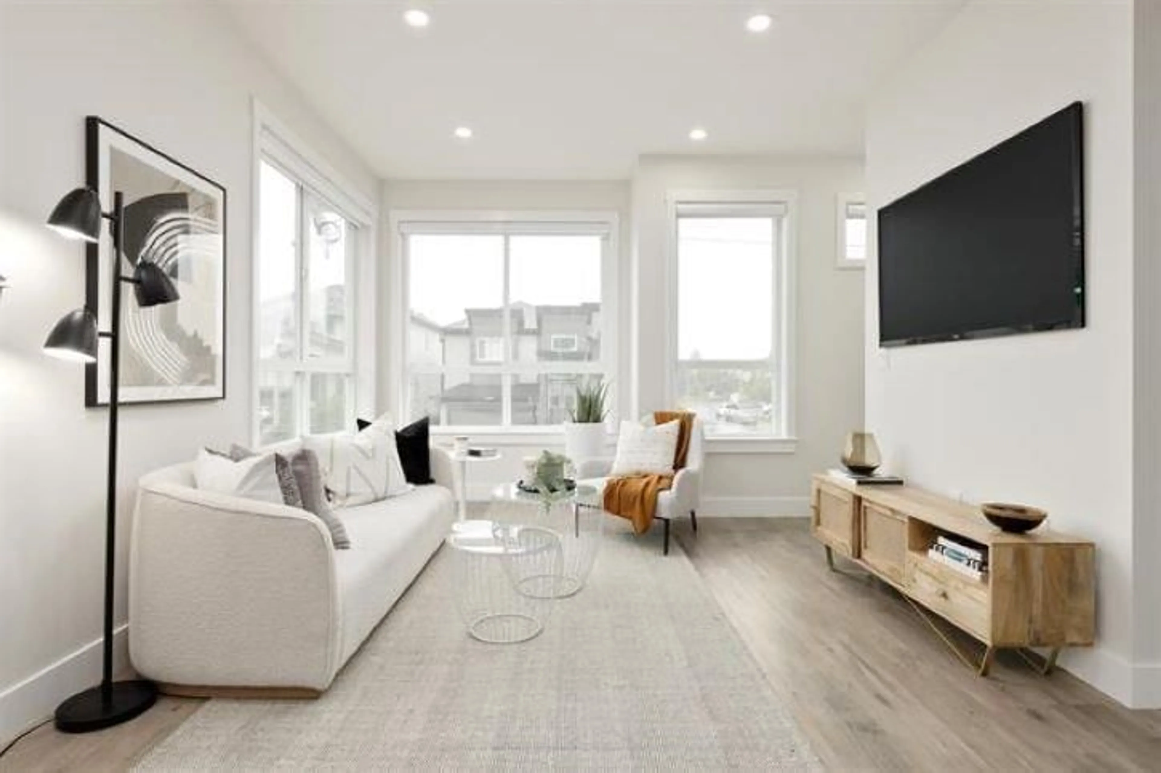 Living room with furniture, wood/laminate floor for 27 - 12830 62, Surrey British Columbia V3X0K8