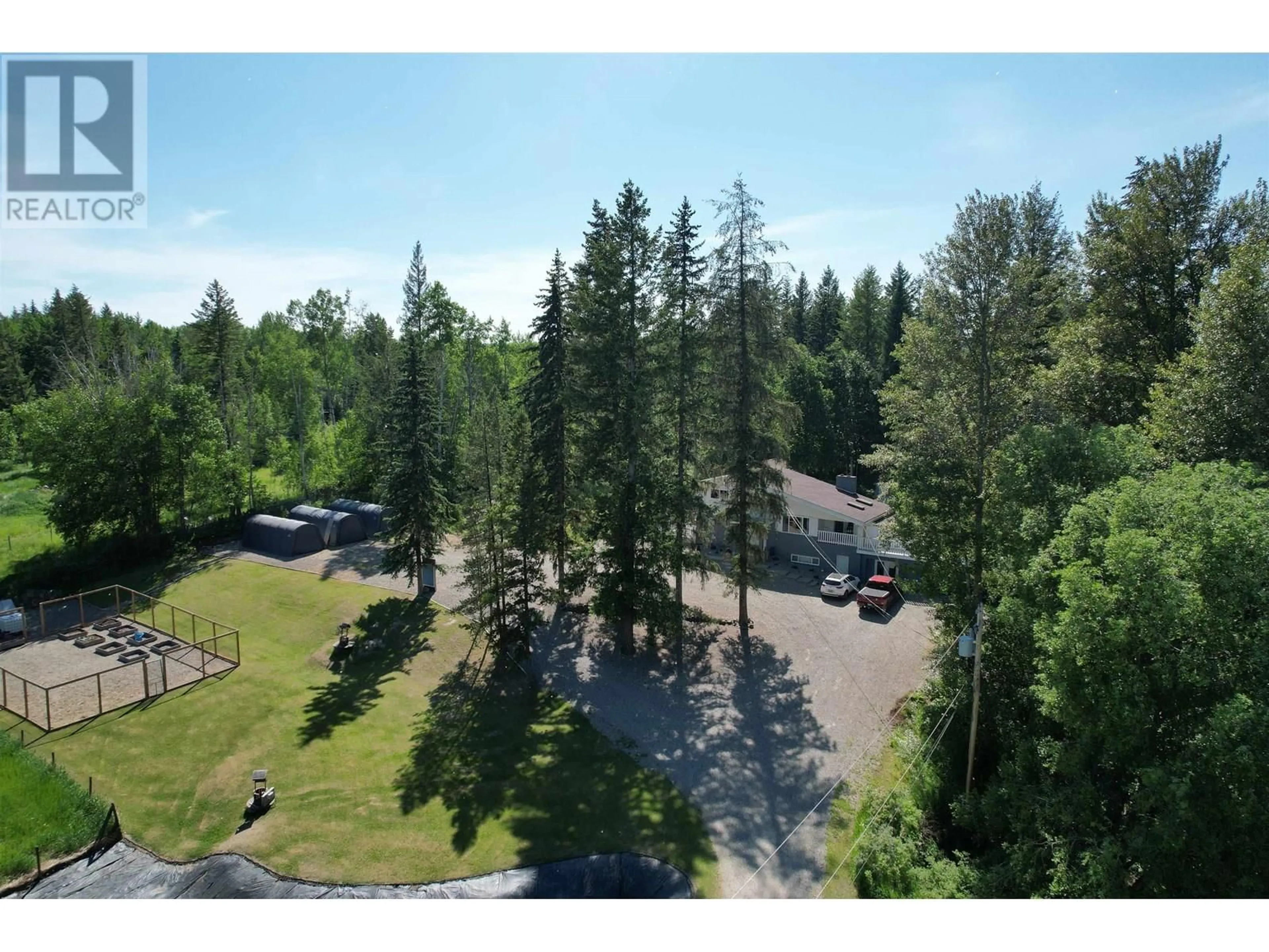 A pic from outside/outdoor area/front of a property/back of a property/a pic from drone, forest/trees view for 2434 RED BLUFF ROAD, Quesnel British Columbia V2J6C2