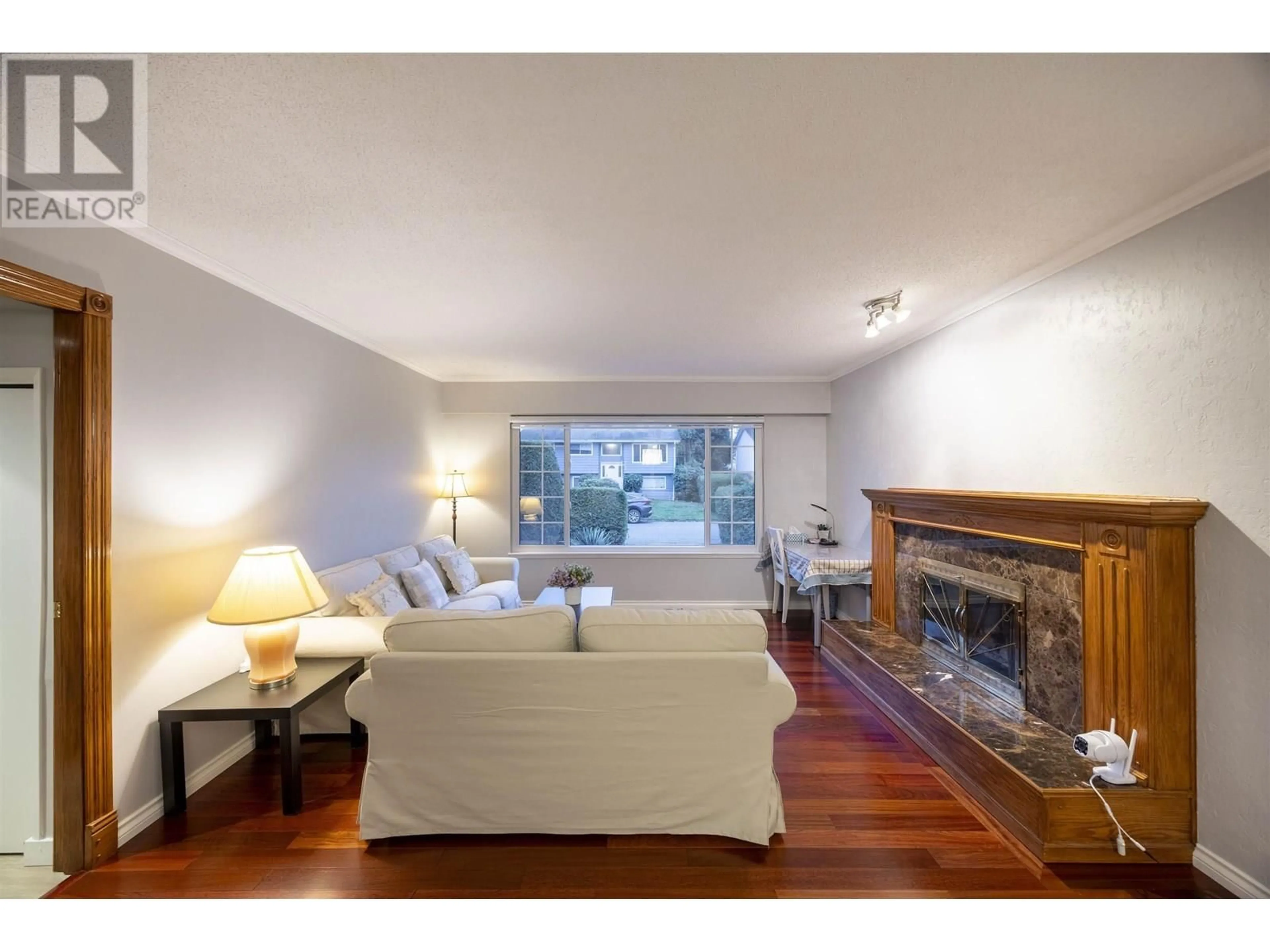 Living room with furniture, wood/laminate floor for 4713 46 AVENUE, Delta British Columbia V4K1N2
