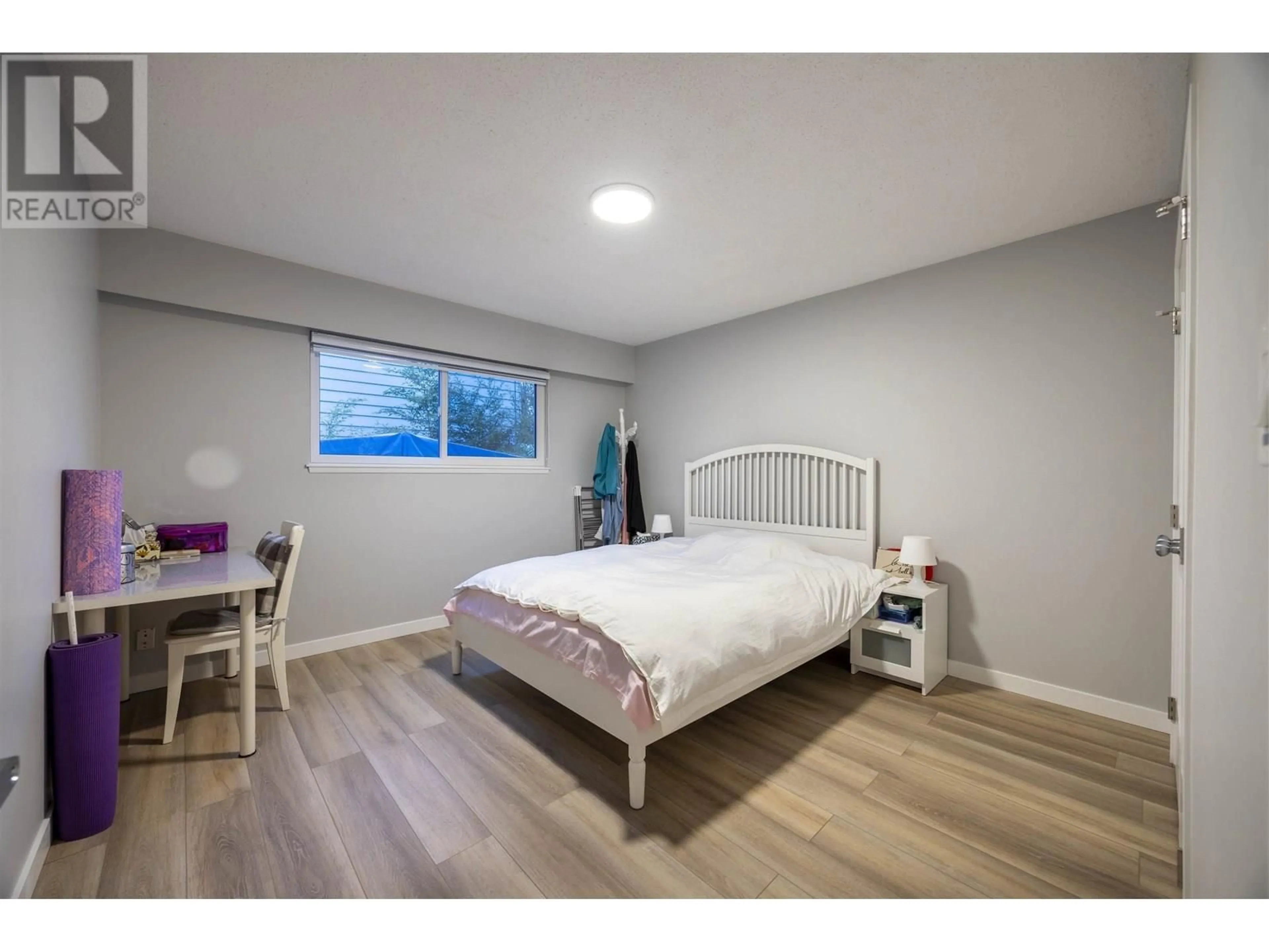 Bedroom with bed, wood/laminate floor for 4713 46 AVENUE, Delta British Columbia V4K1N2
