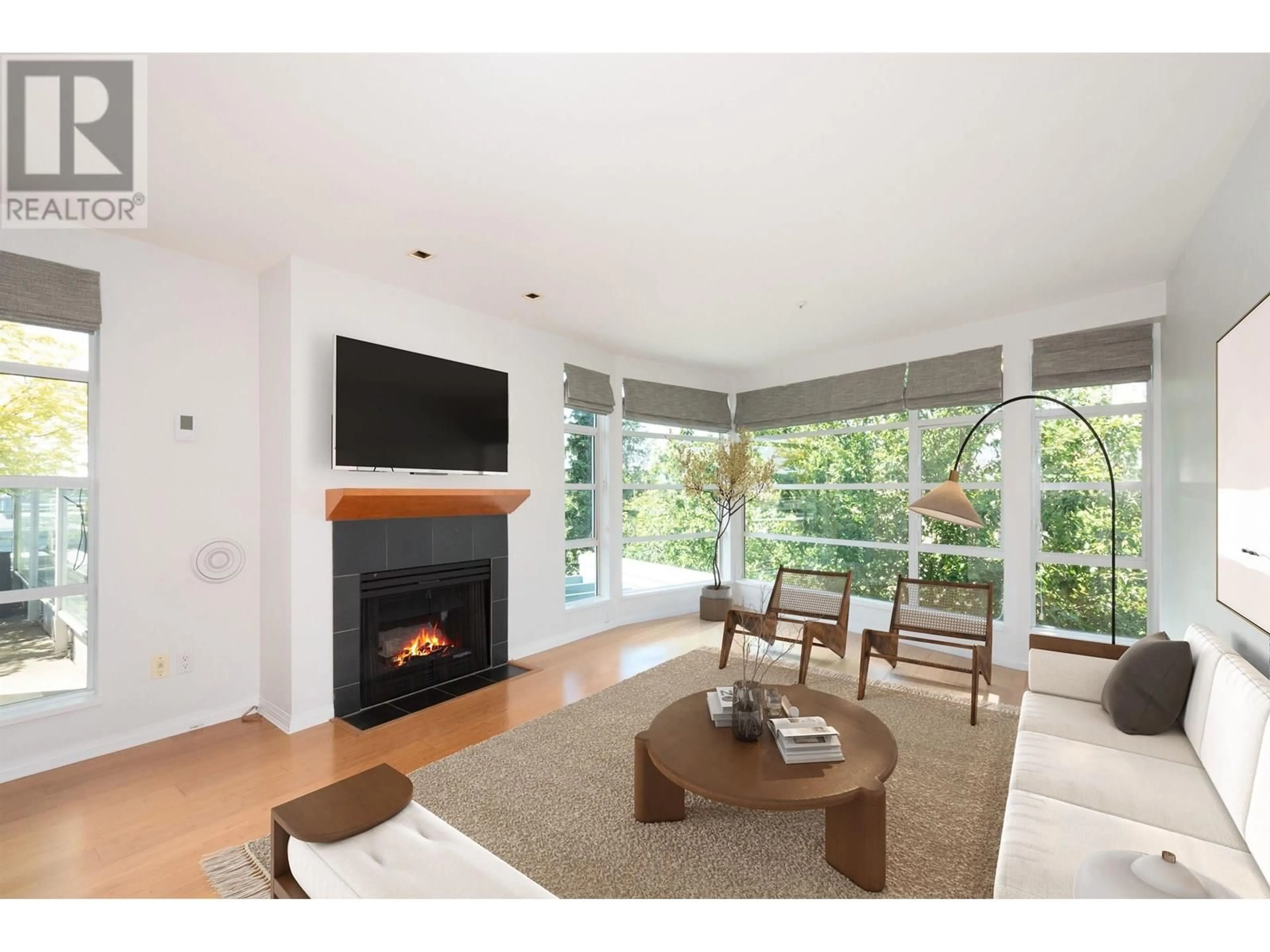 Living room with furniture, wood/laminate floor for 403 - 2555 4TH AVENUE, Vancouver British Columbia V6K1P5