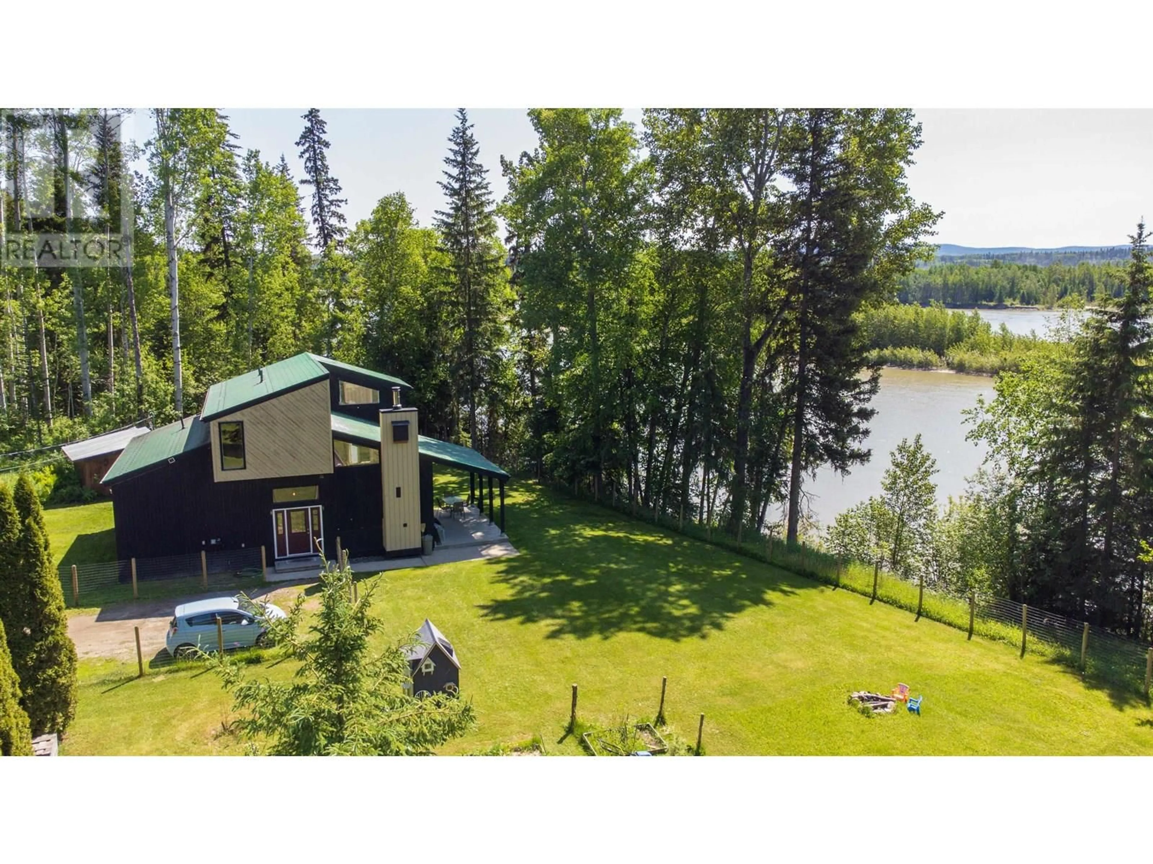 A pic from outside/outdoor area/front of a property/back of a property/a pic from drone, water/lake/river/ocean view for 4294 HANET ROAD, Prince George British Columbia V2K5S1