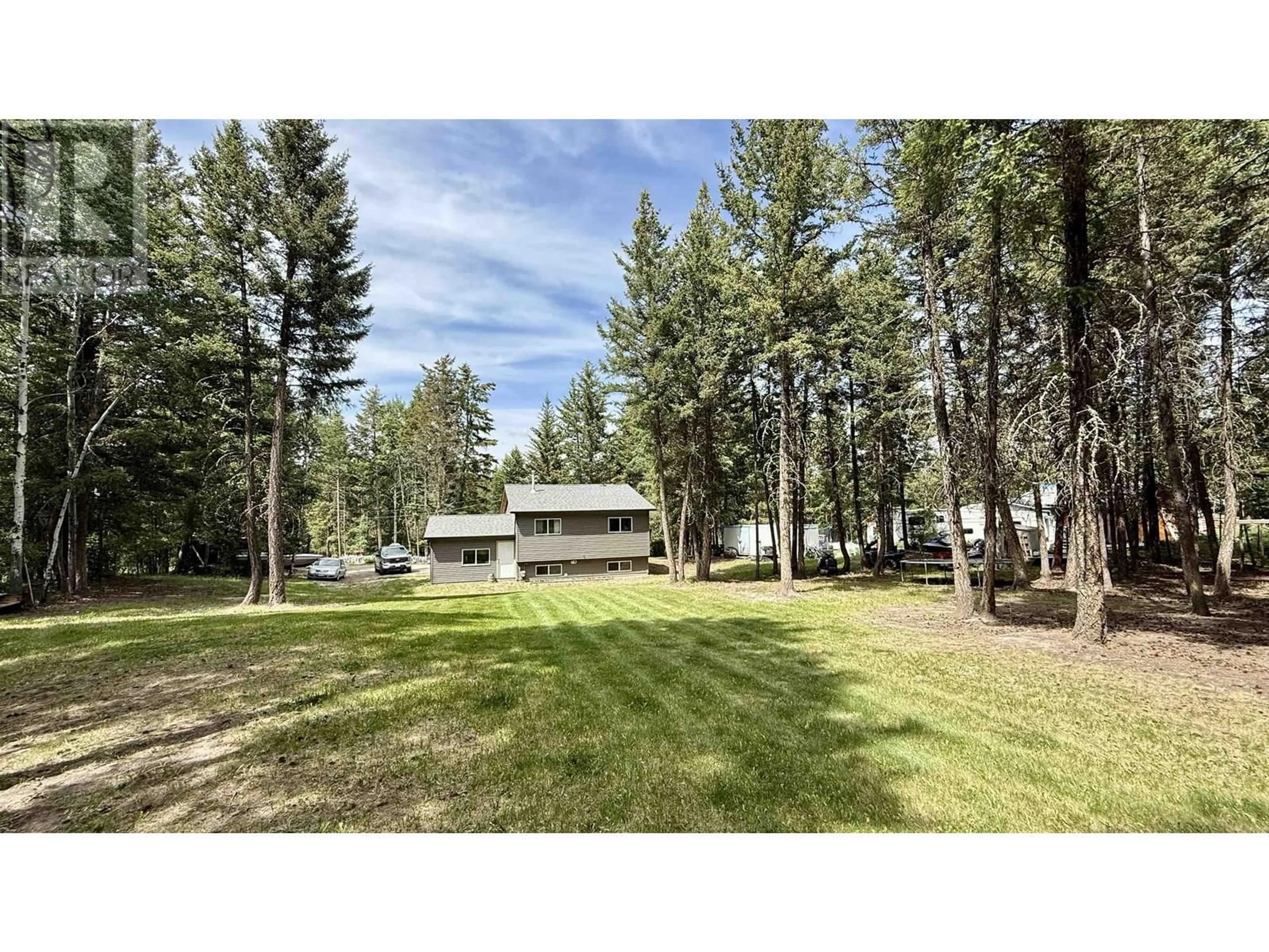 A pic from outside/outdoor area/front of a property/back of a property/a pic from drone, forest/trees view for 4755 ANZEEON ROAD, 108 Mile Ranch British Columbia V0K2Z0