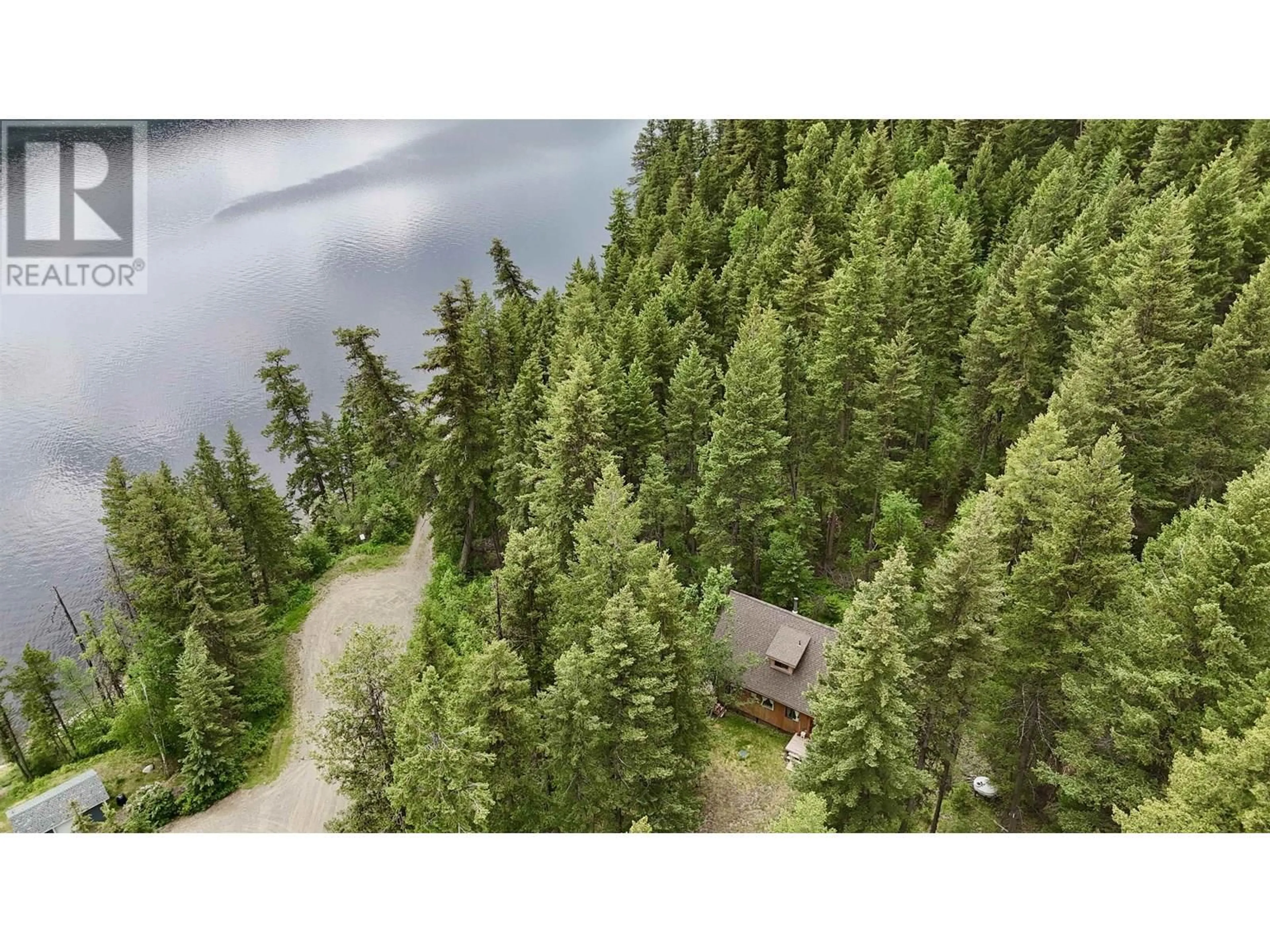 A pic from outside/outdoor area/front of a property/back of a property/a pic from drone, forest/trees view for 4296 RAINBOW ROAD, Canim Lake British Columbia V0K1J0
