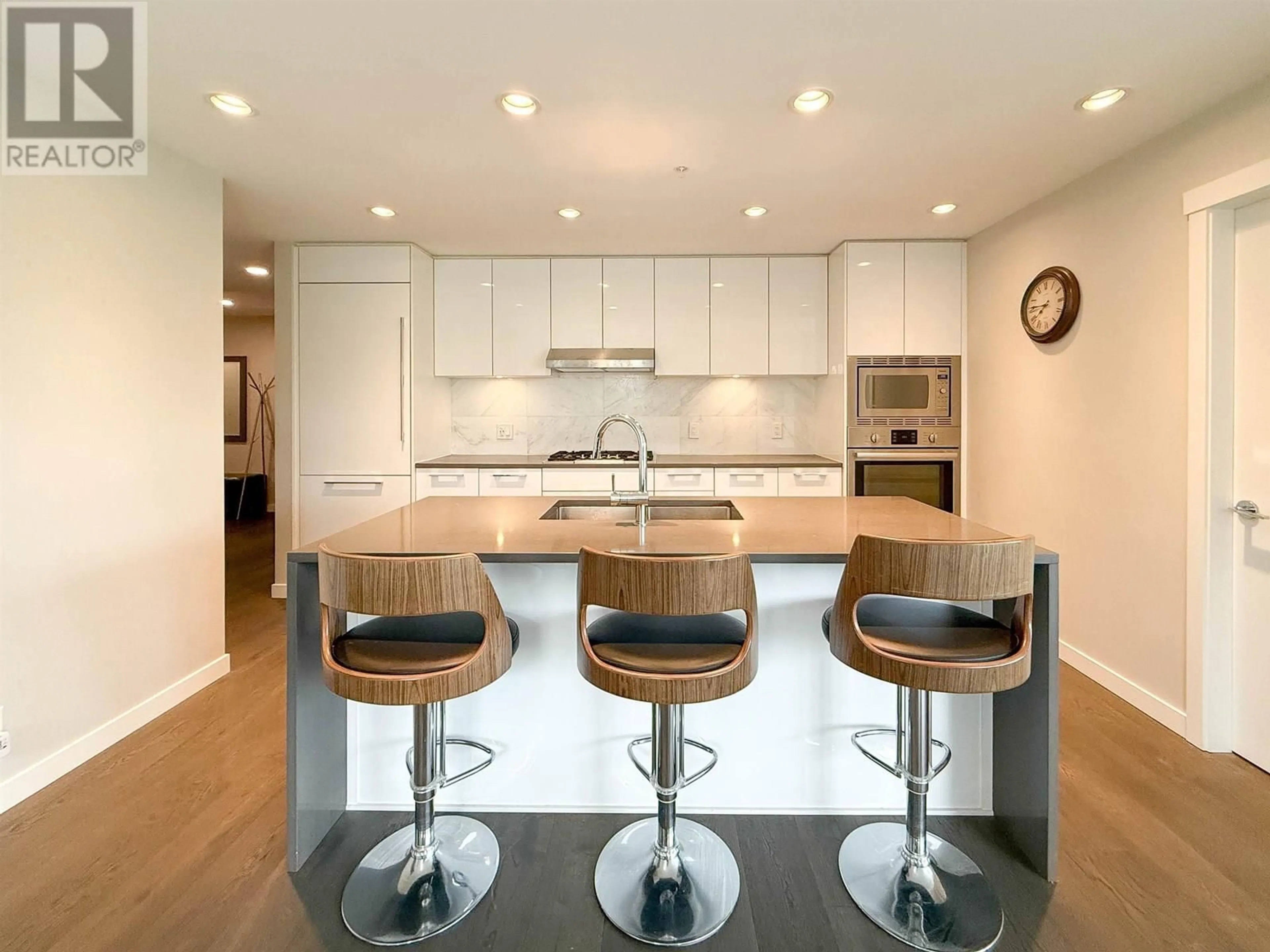 Contemporary kitchen, wood/laminate floor for 309 - 3487 BINNING ROAD, Vancouver British Columbia V6S0K8