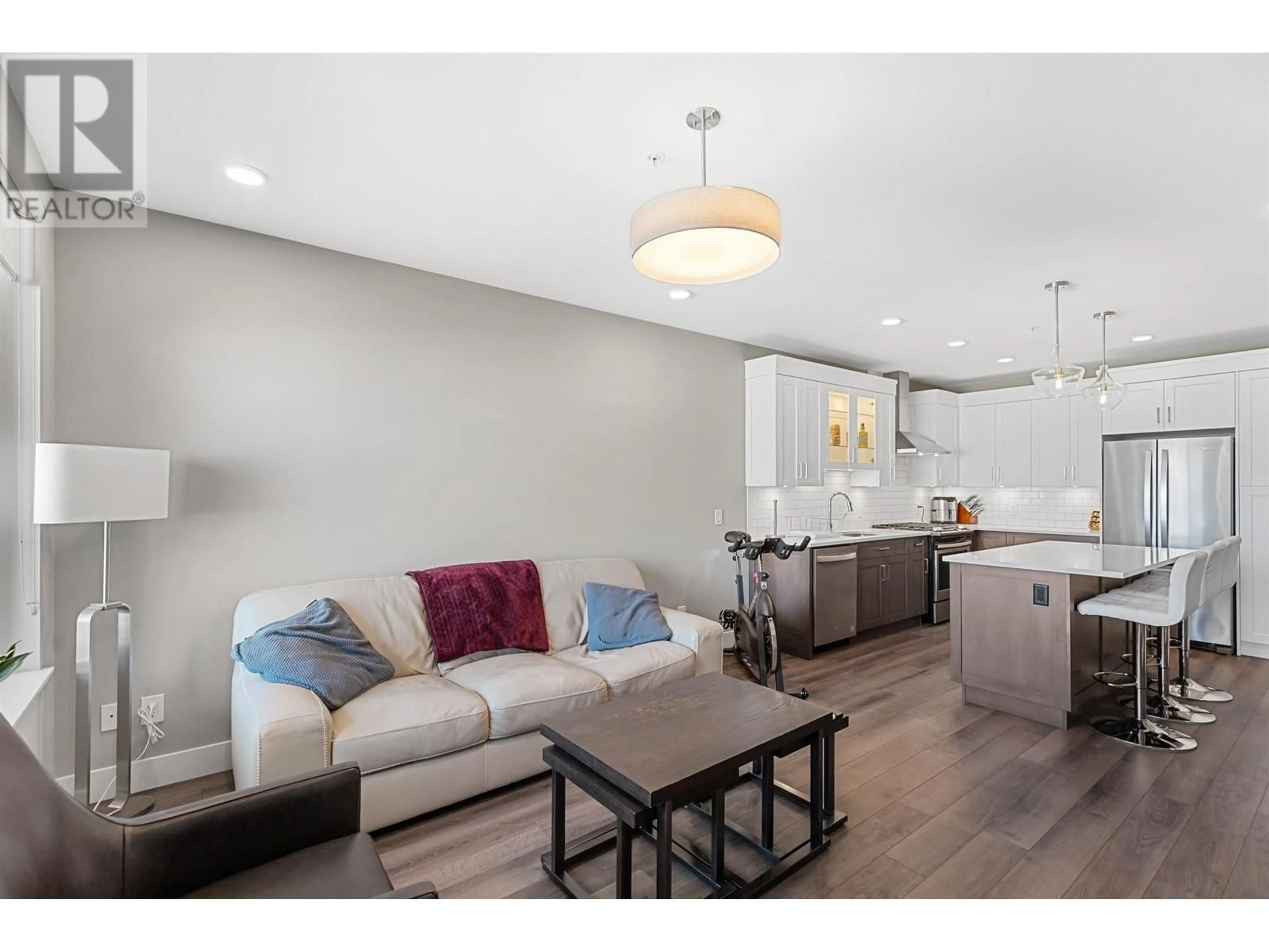 Open concept kitchen, wood/laminate floor for 406 - 1087 6TH AVENUE, Prince George British Columbia V2L0E5