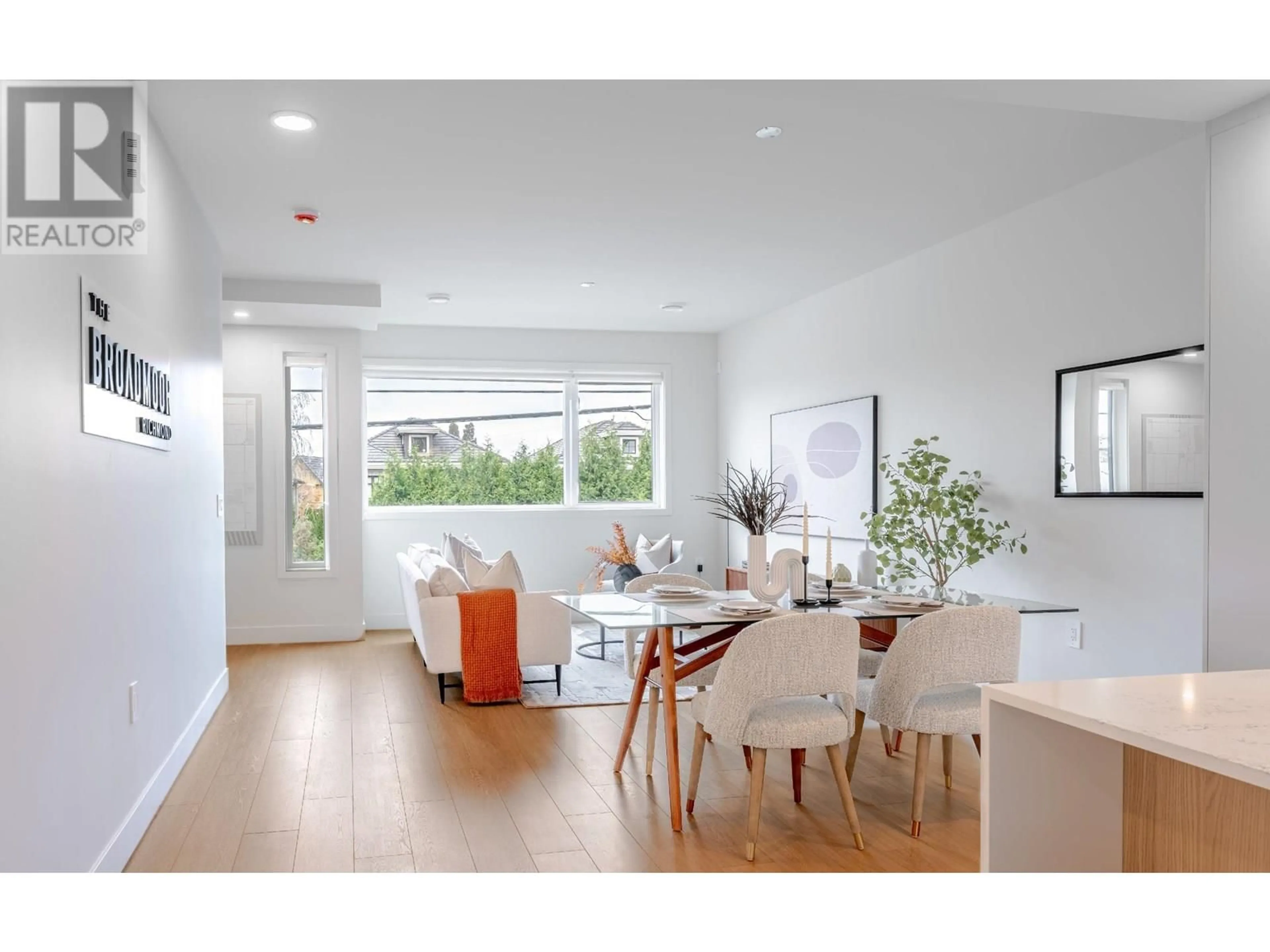 Living room with furniture, wood/laminate floor for 10 - 8300 NO. 3 ROAD, Richmond British Columbia V6Y2E3