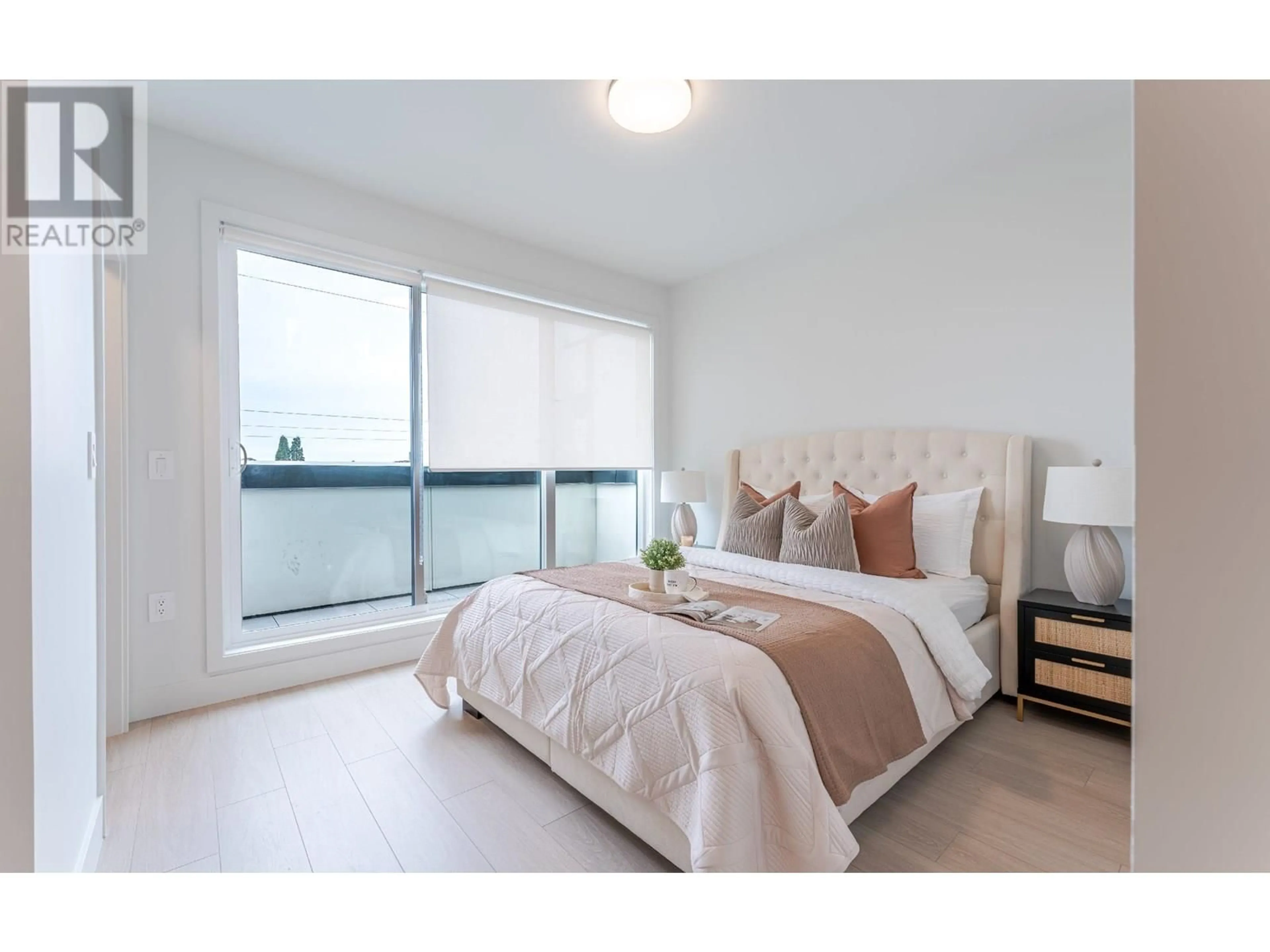 Bedroom with bed, wood/laminate floor for 10 - 8300 NO. 3 ROAD, Richmond British Columbia V6Y2E3