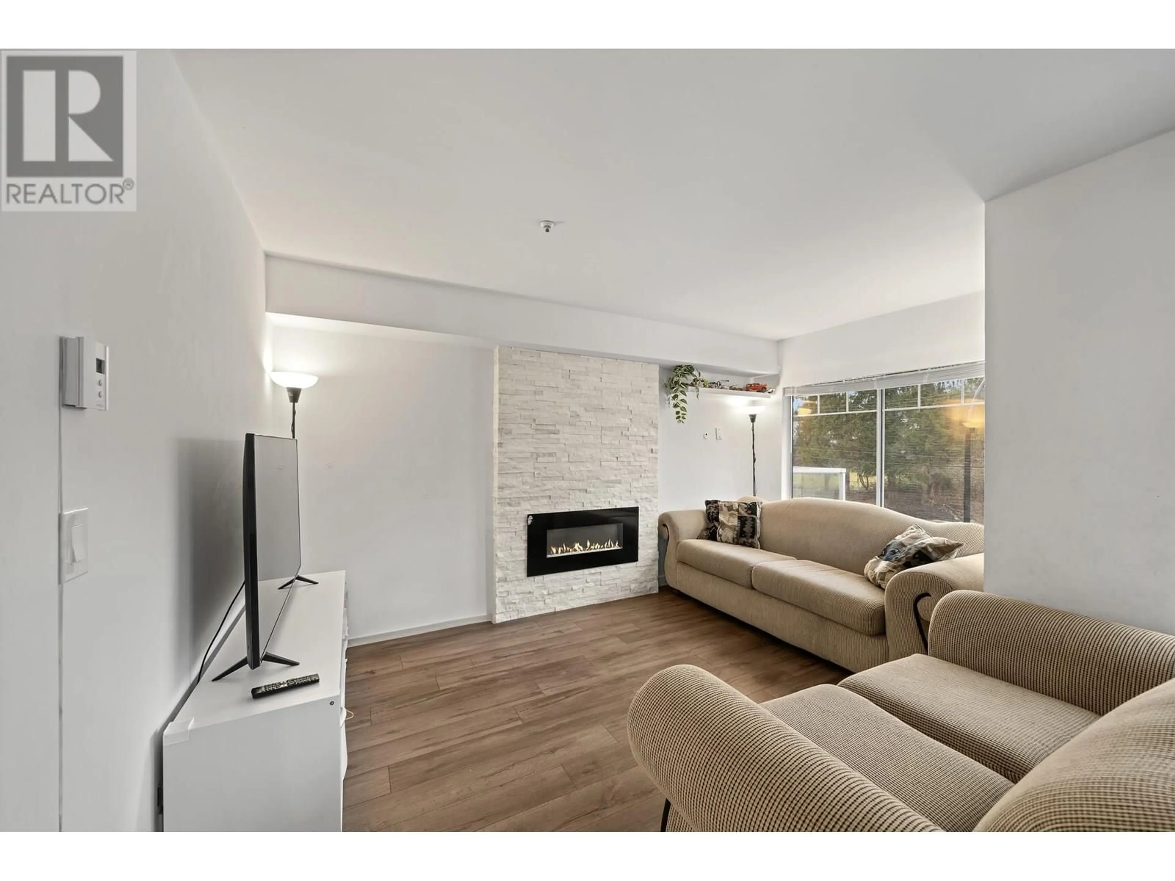 Living room with furniture, unknown for 201 - 11671 FRASER STREET, Maple Ridge British Columbia V2X6C4