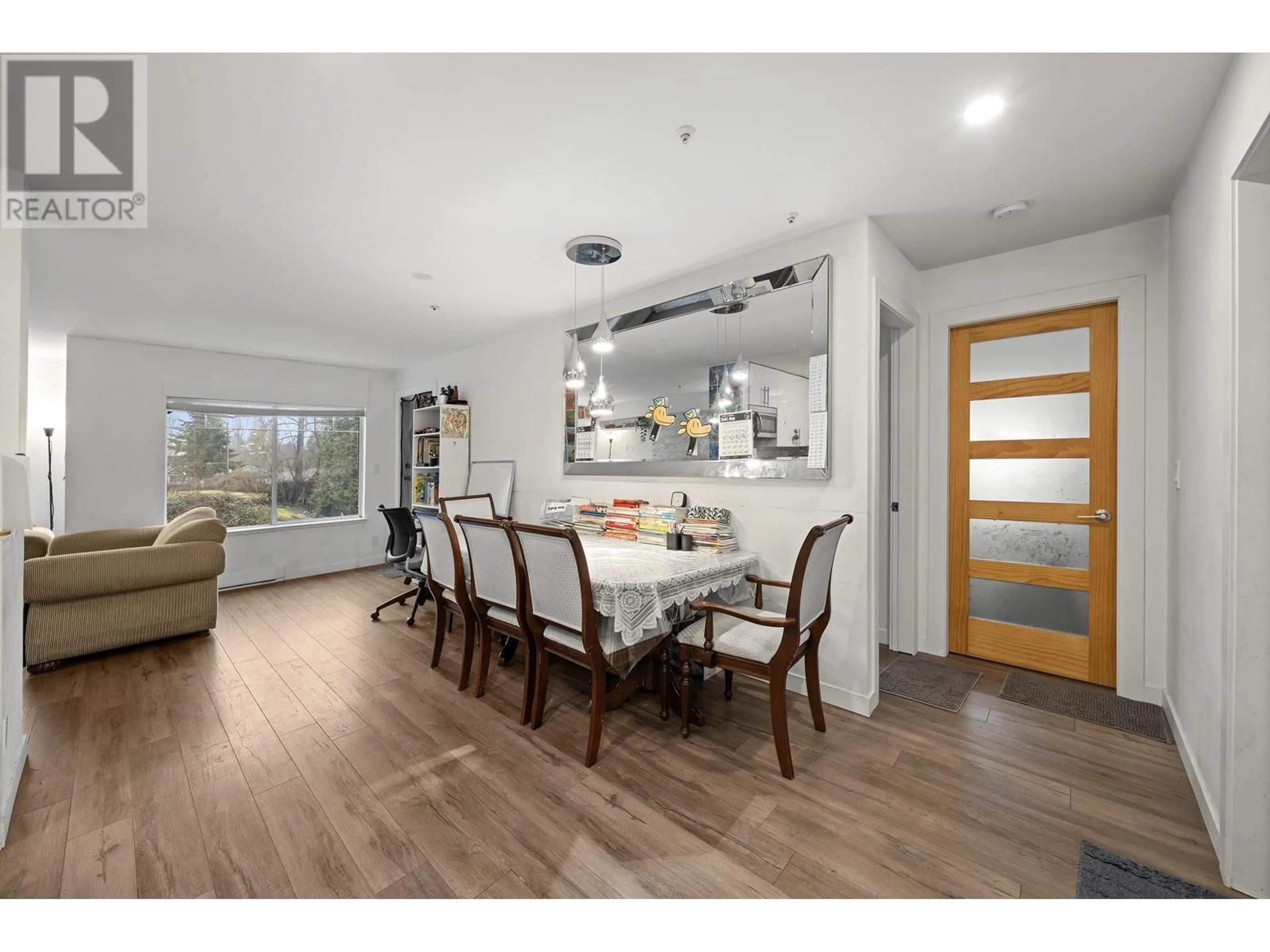 Open concept kitchen, wood/laminate floor for 201 - 11671 FRASER STREET, Maple Ridge British Columbia V2X6C4