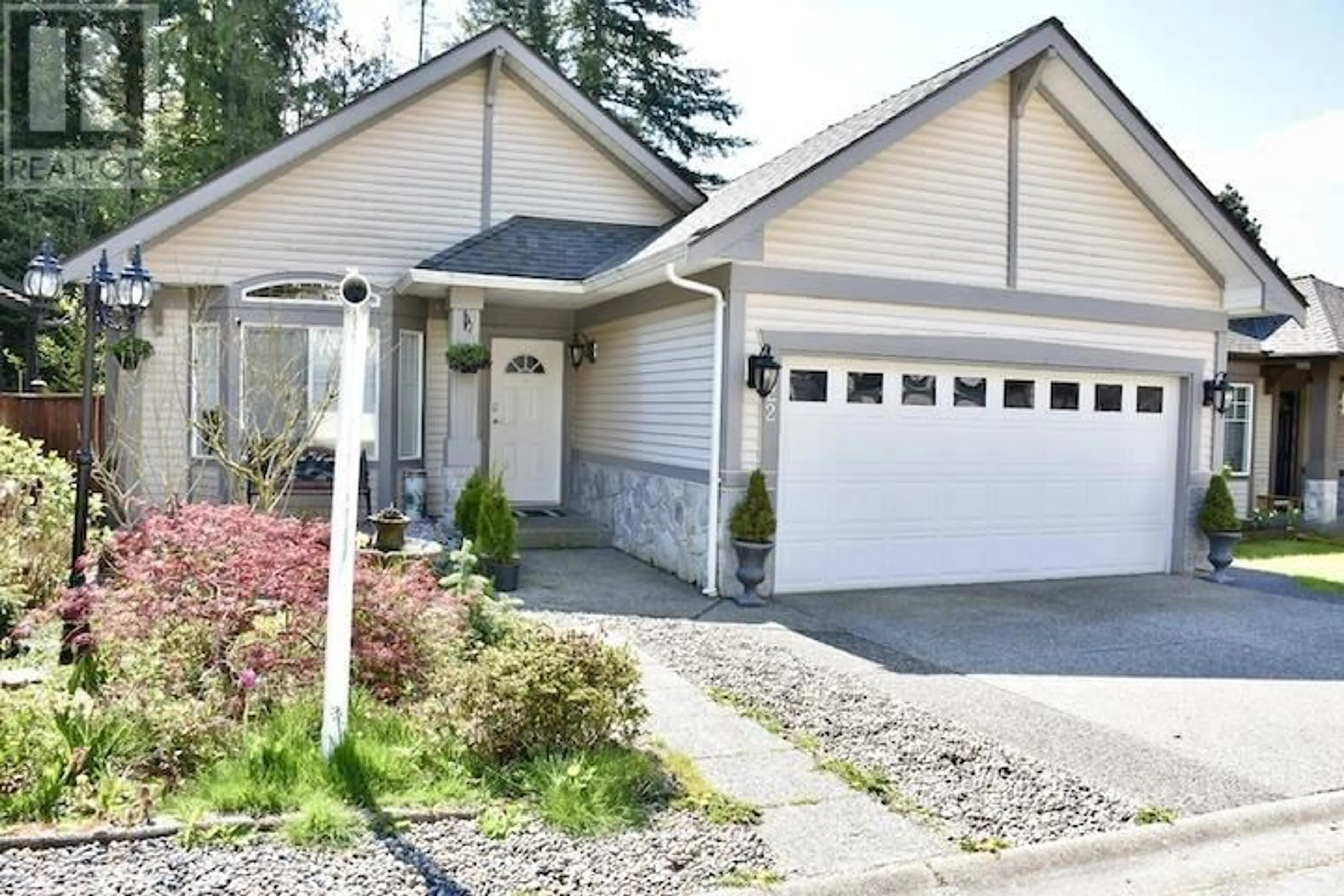 Home with vinyl exterior material, street for 122 BLACKBERRY DRIVE, Anmore British Columbia V3H5B4
