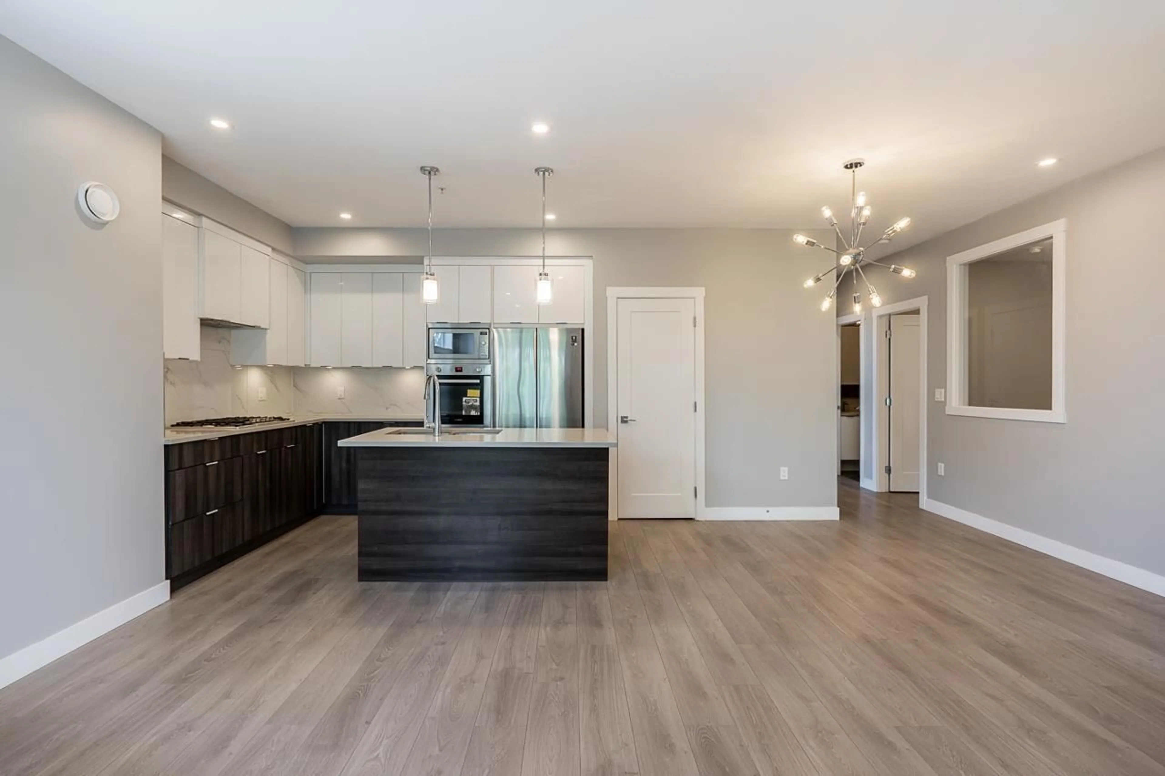 Open concept kitchen, unknown for 307 - 14468 72, Surrey British Columbia V3S0B6