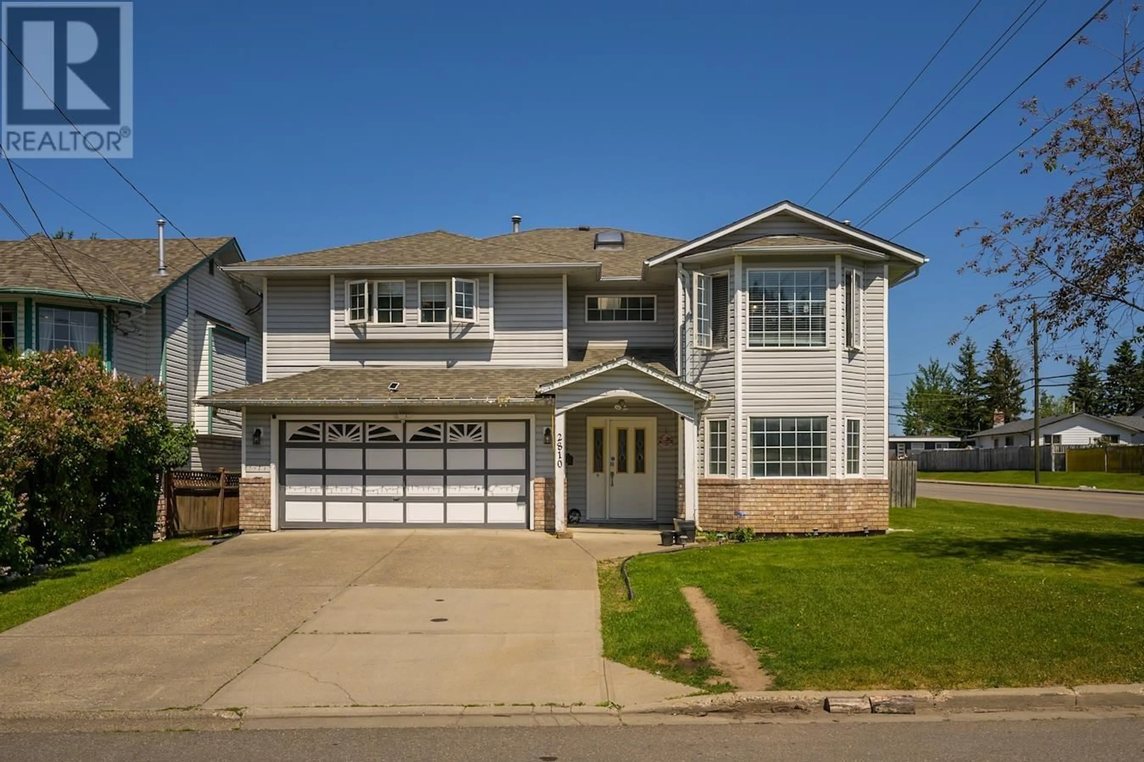 Home with vinyl exterior material, street for 2810 GOGOLIN ROAD, Prince George British Columbia V2N1N2