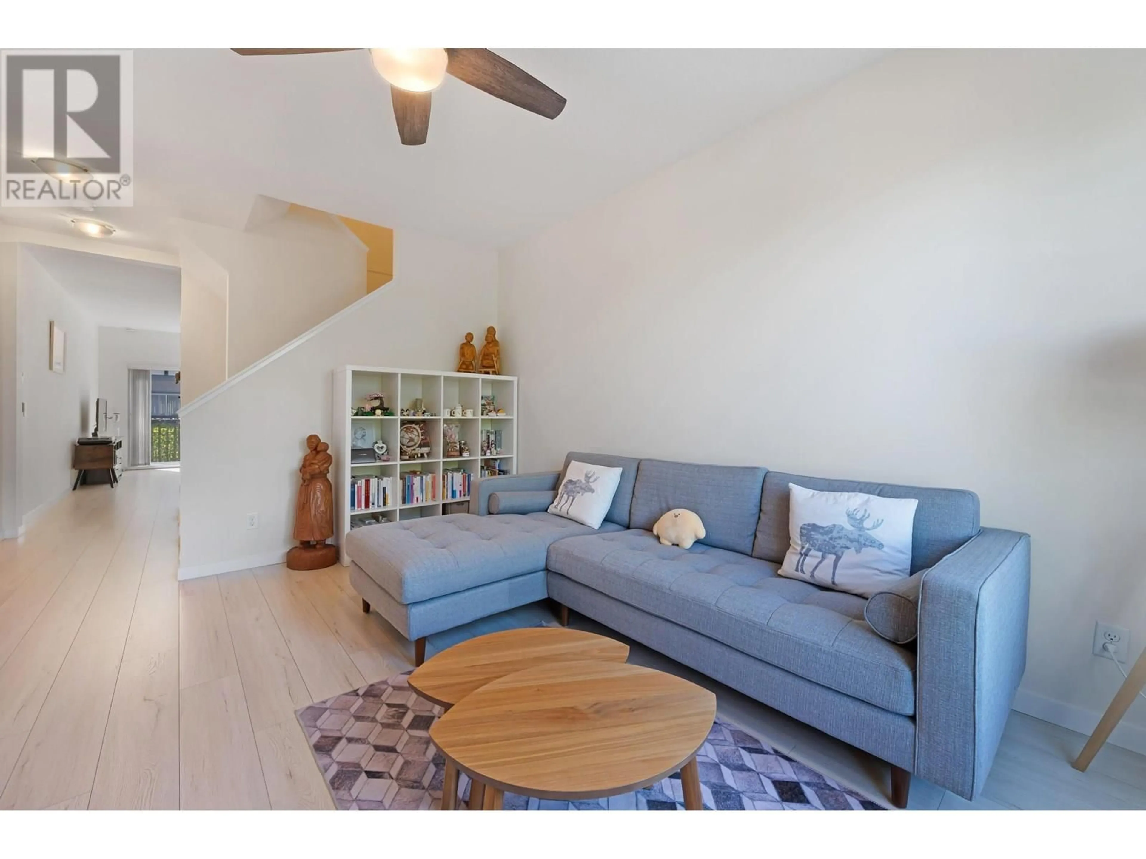 Living room with furniture, wood/laminate floor for 75 - 9566 TOMICKI AVENUE, Richmond British Columbia V6X0E6