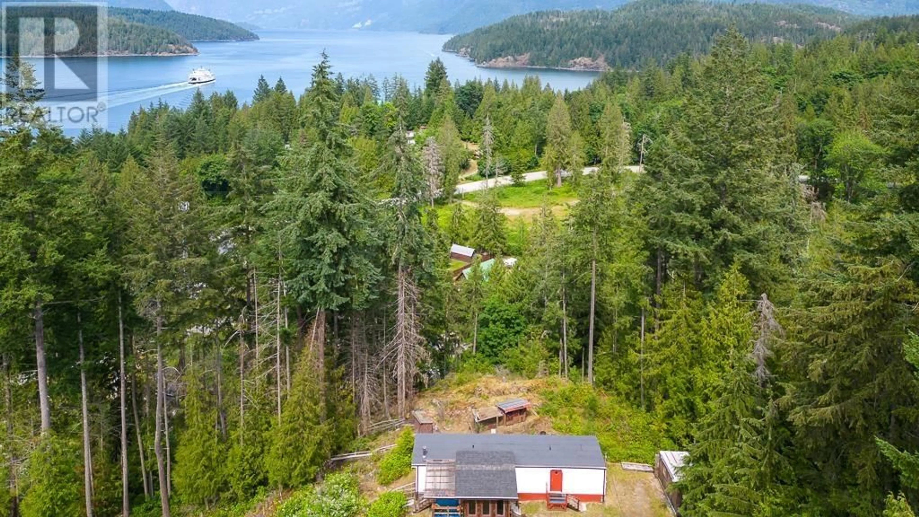 A pic from outside/outdoor area/front of a property/back of a property/a pic from drone, water/lake/river/ocean view for 5349 MOUNTAINVIEW ROAD, Madeira Park British Columbia V0N2H4