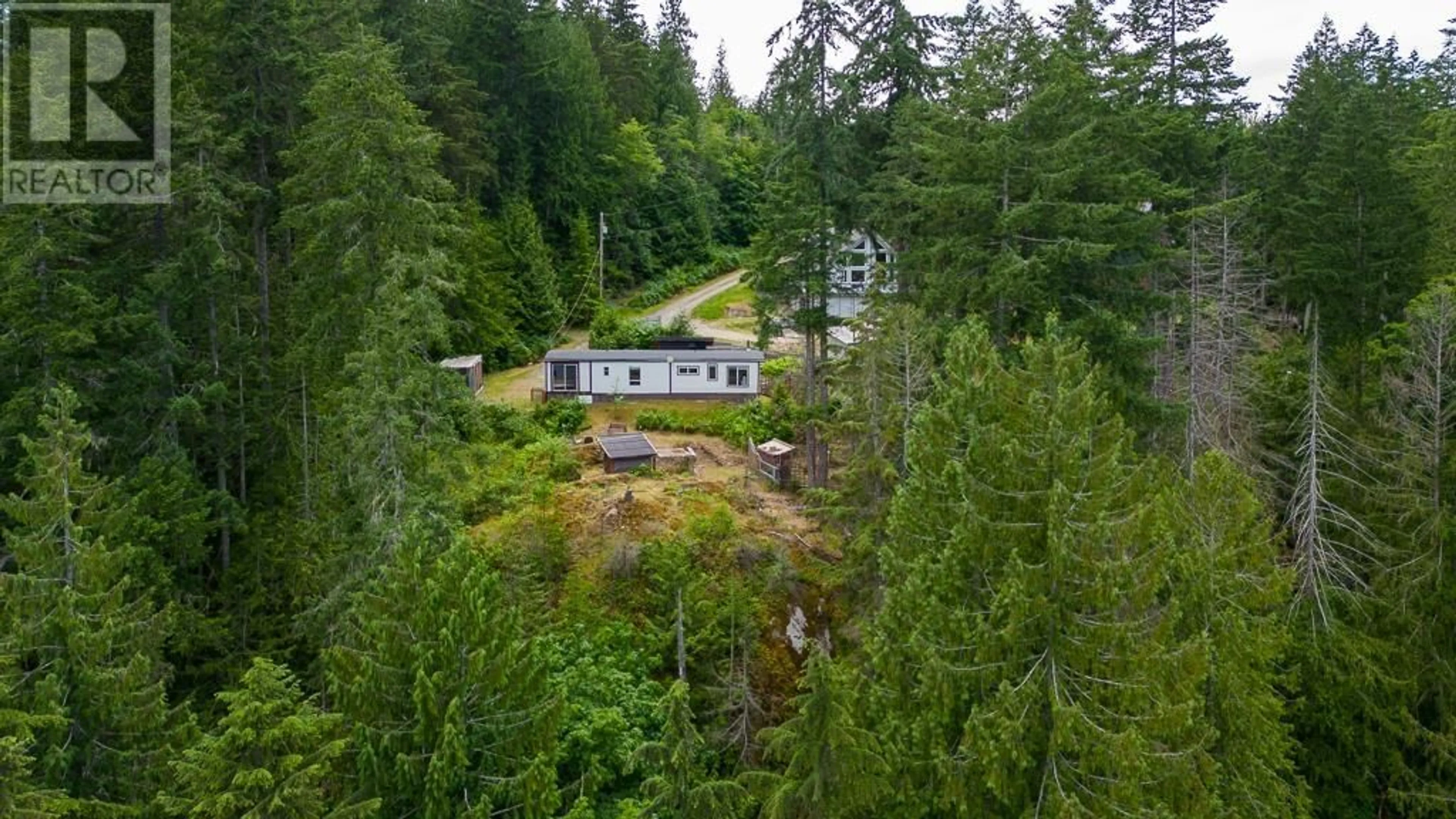 A pic from outside/outdoor area/front of a property/back of a property/a pic from drone, forest/trees view for 5349 MOUNTAINVIEW ROAD, Madeira Park British Columbia V0N2H4