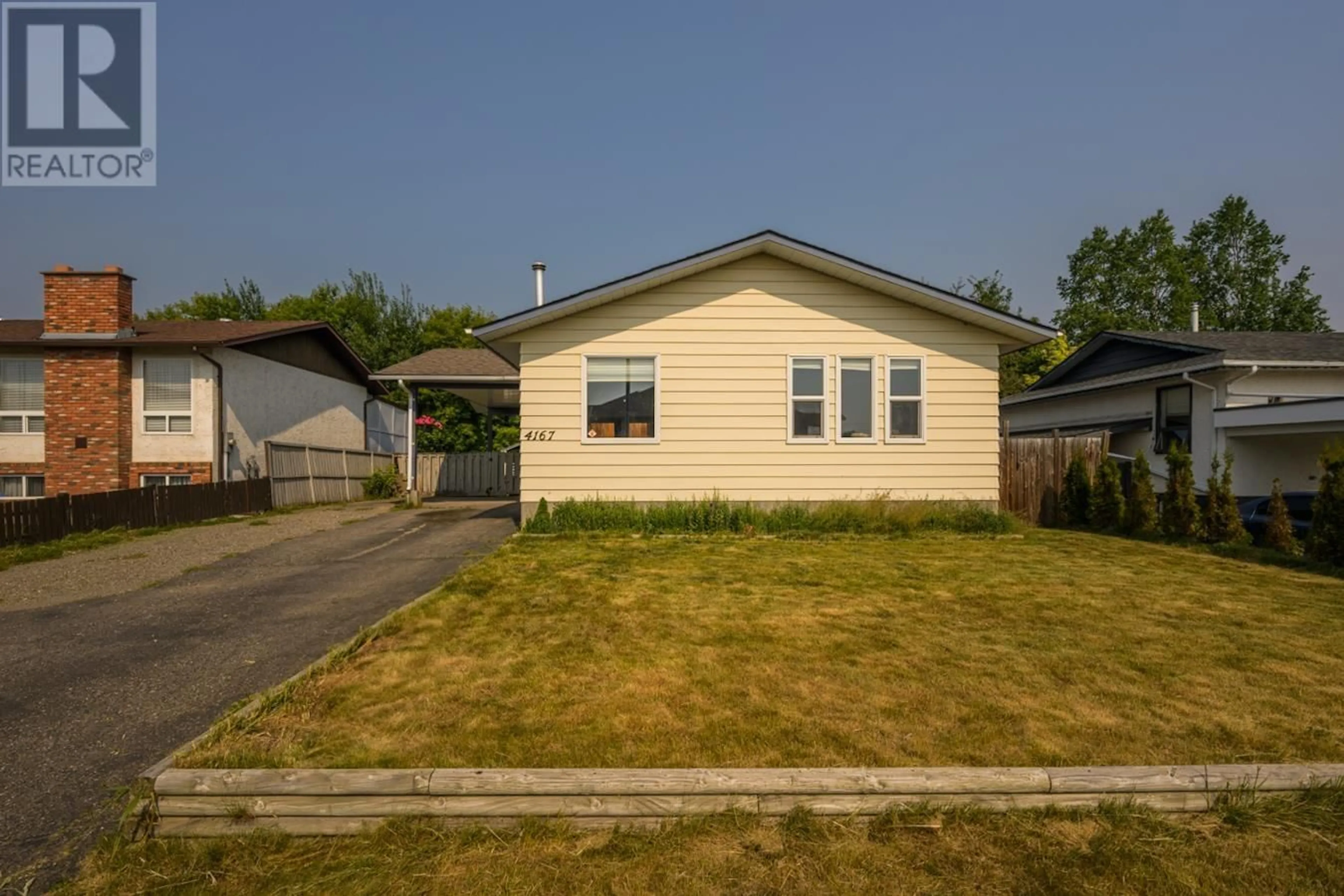 Home with vinyl exterior material, street for 4167 PRUDENTE ROAD, Prince George British Columbia V2N5K3