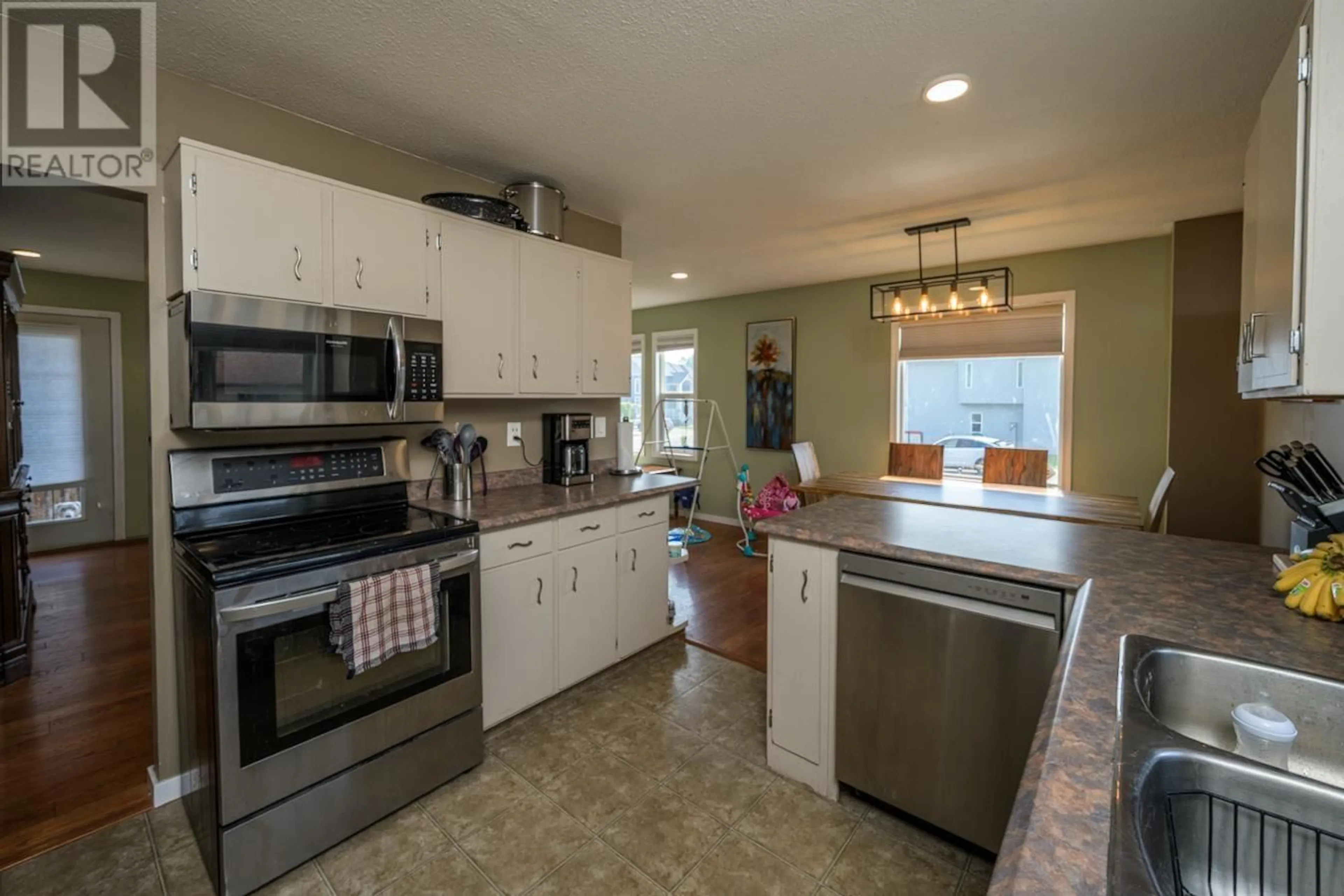 Open concept kitchen, ceramic/tile floor for 4167 PRUDENTE ROAD, Prince George British Columbia V2N5K3