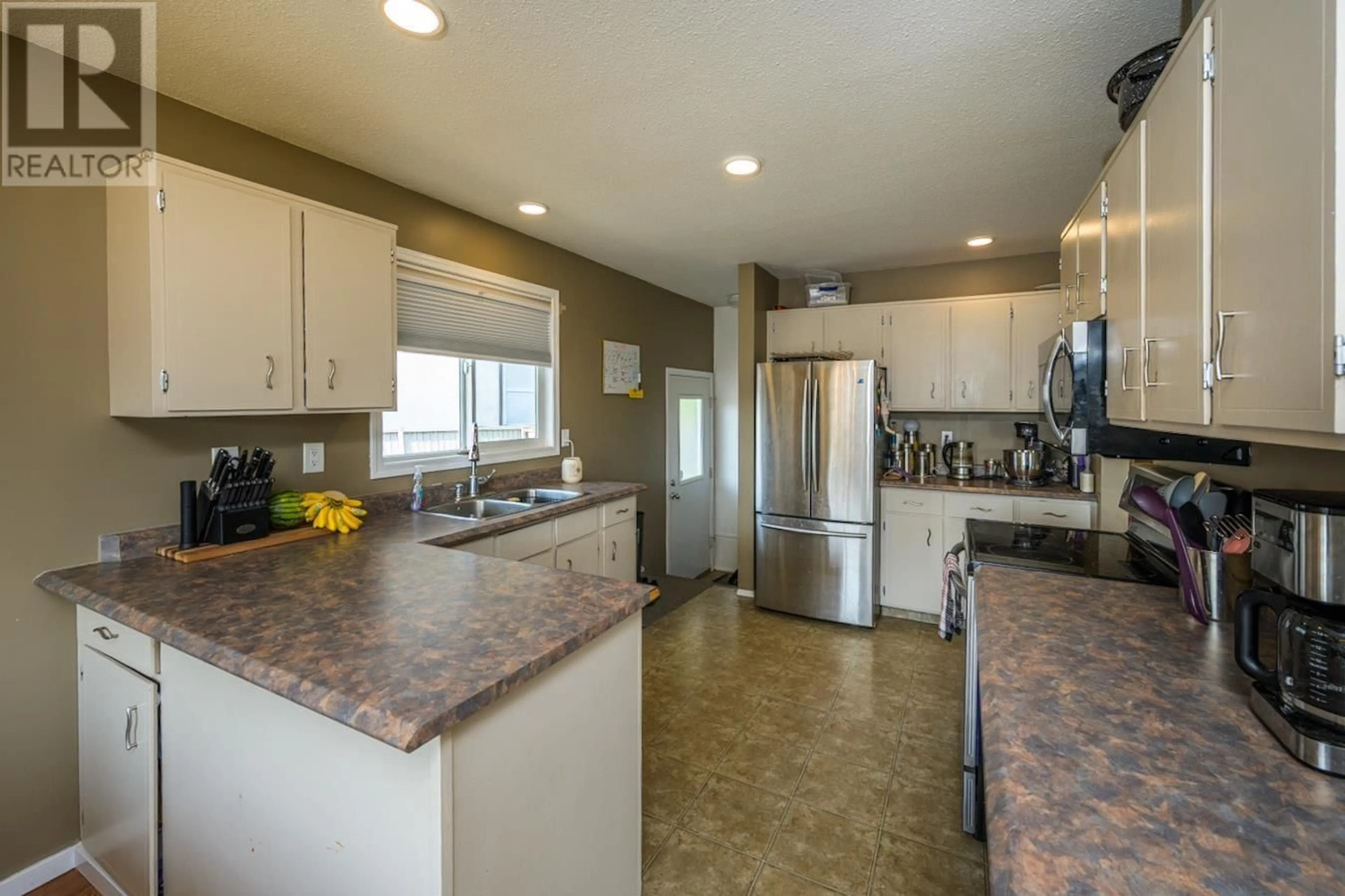 Open concept kitchen, ceramic/tile floor for 4167 PRUDENTE ROAD, Prince George British Columbia V2N5K3