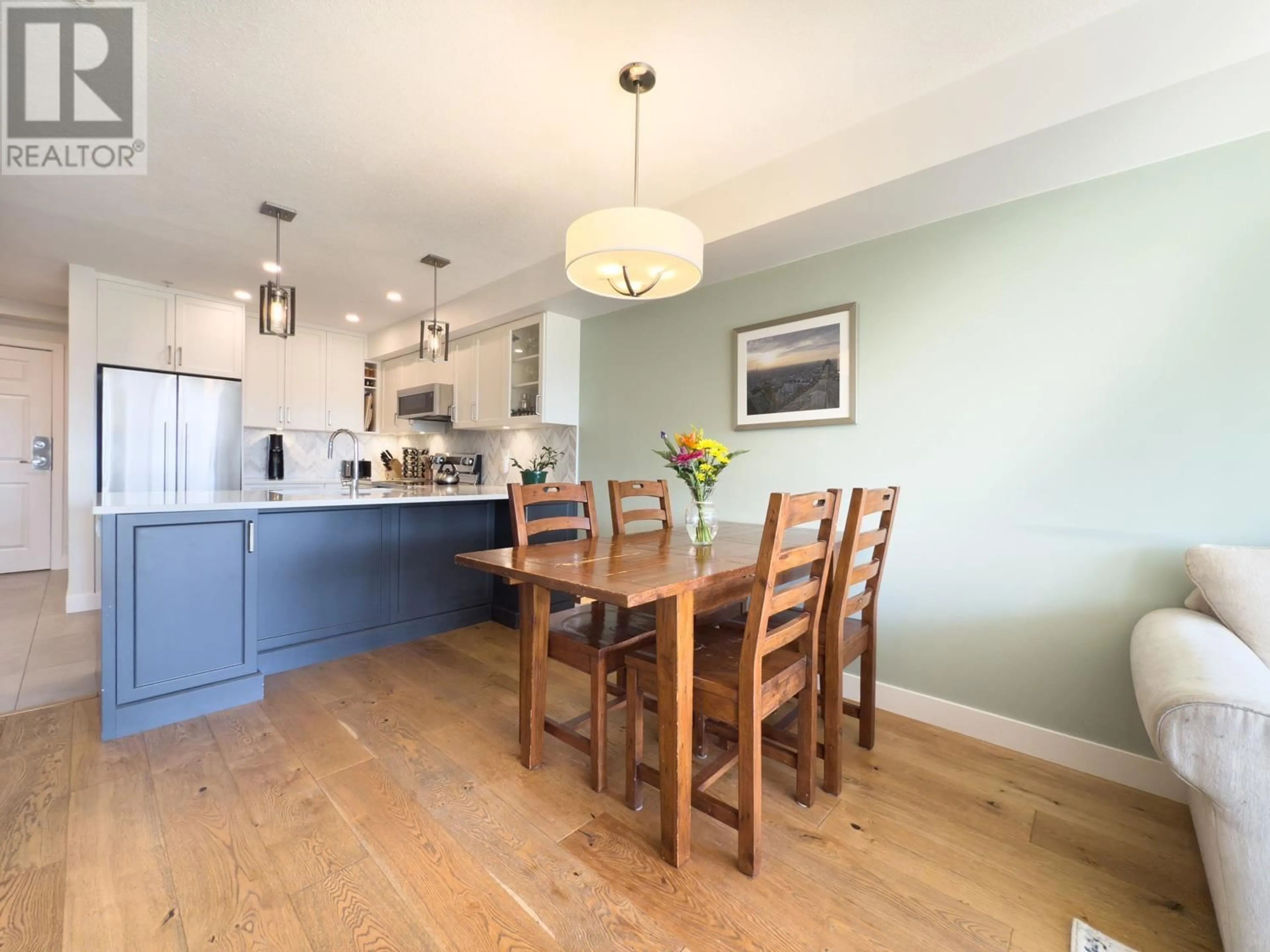Open concept kitchen, wood/laminate floor for 306 - 1707 CHARLES STREET, Vancouver British Columbia V5L2T6