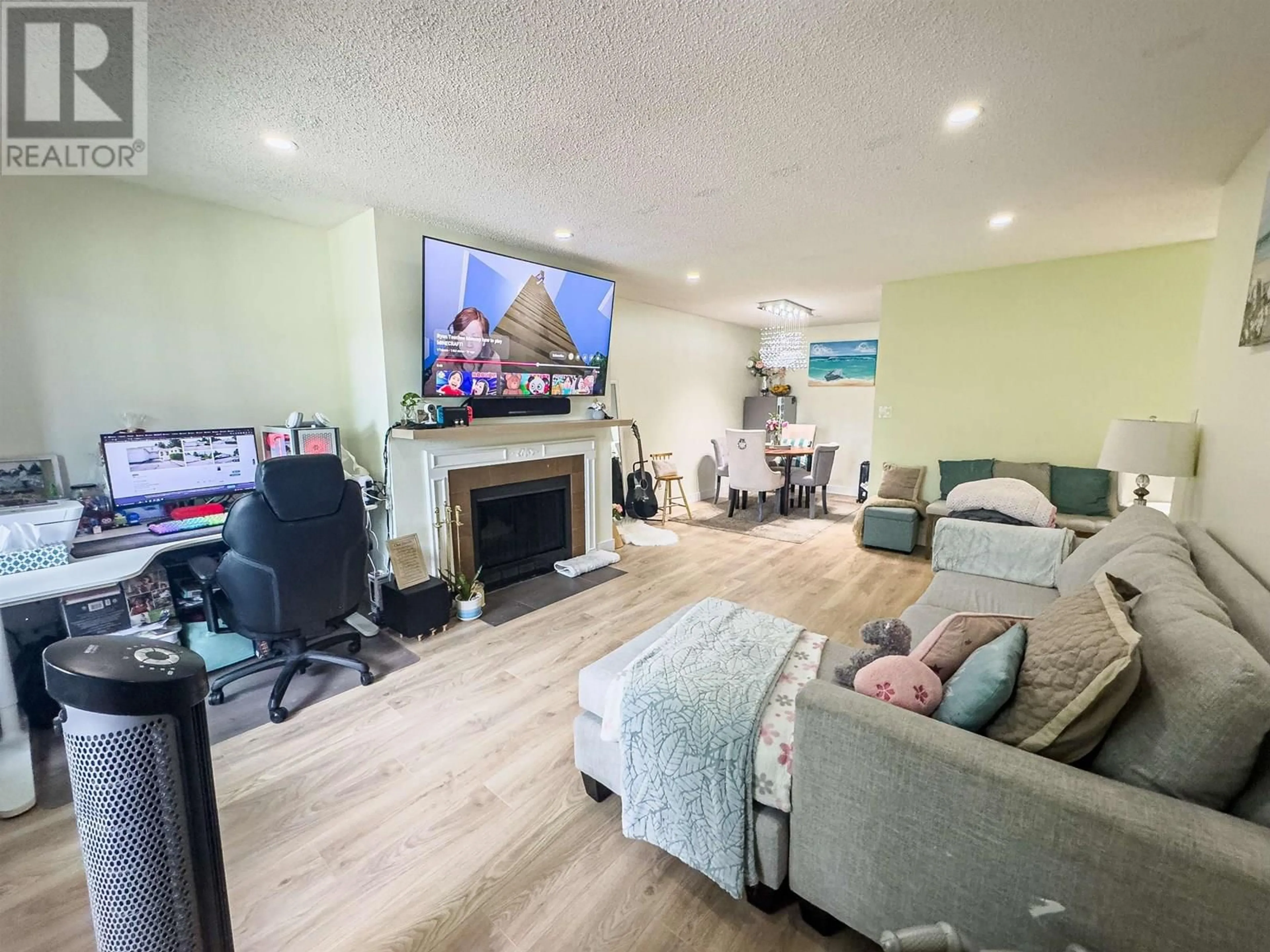 Living room with furniture, wood/laminate floor for 204 - 8591 WESTMINSTER HIGHWAY, Richmond British Columbia V6X3E2