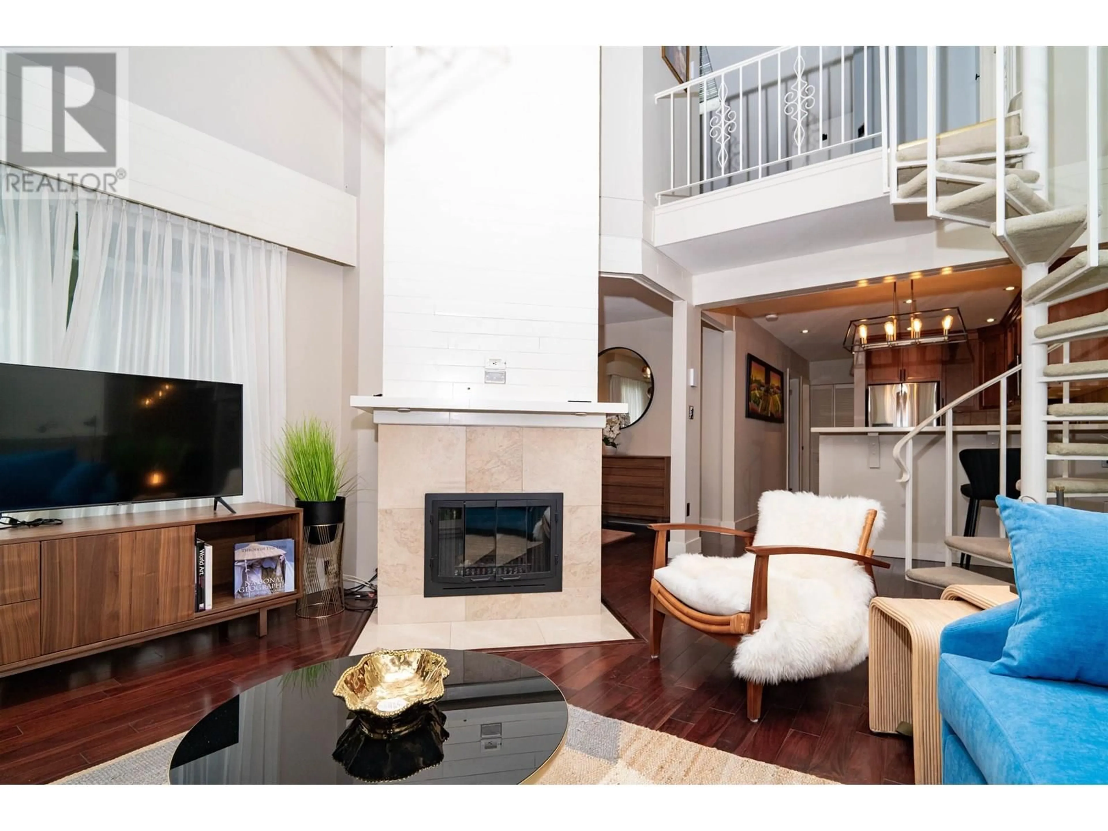 Living room with furniture, wood/laminate floor for 409 - 1274 BARCLAY STREET, Vancouver British Columbia V6E1H3
