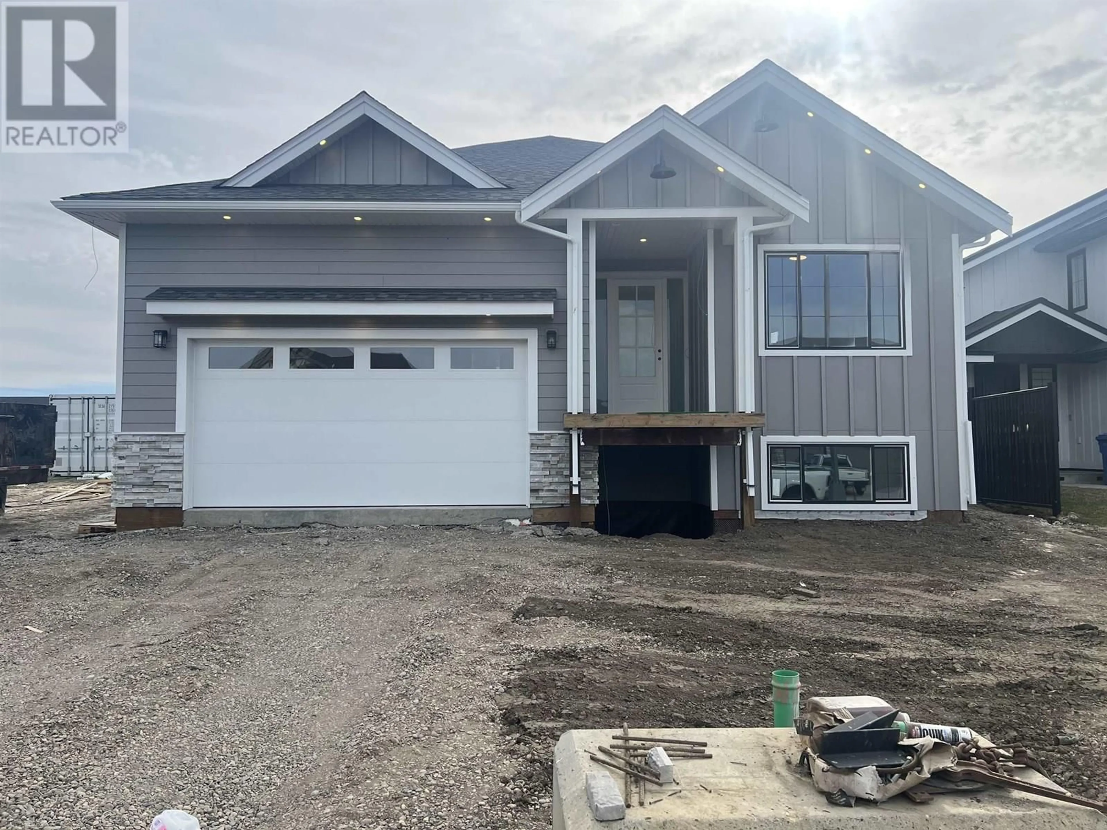 Home with vinyl exterior material, street for 10611 111 STREET, Fort St. John British Columbia V1J0L6