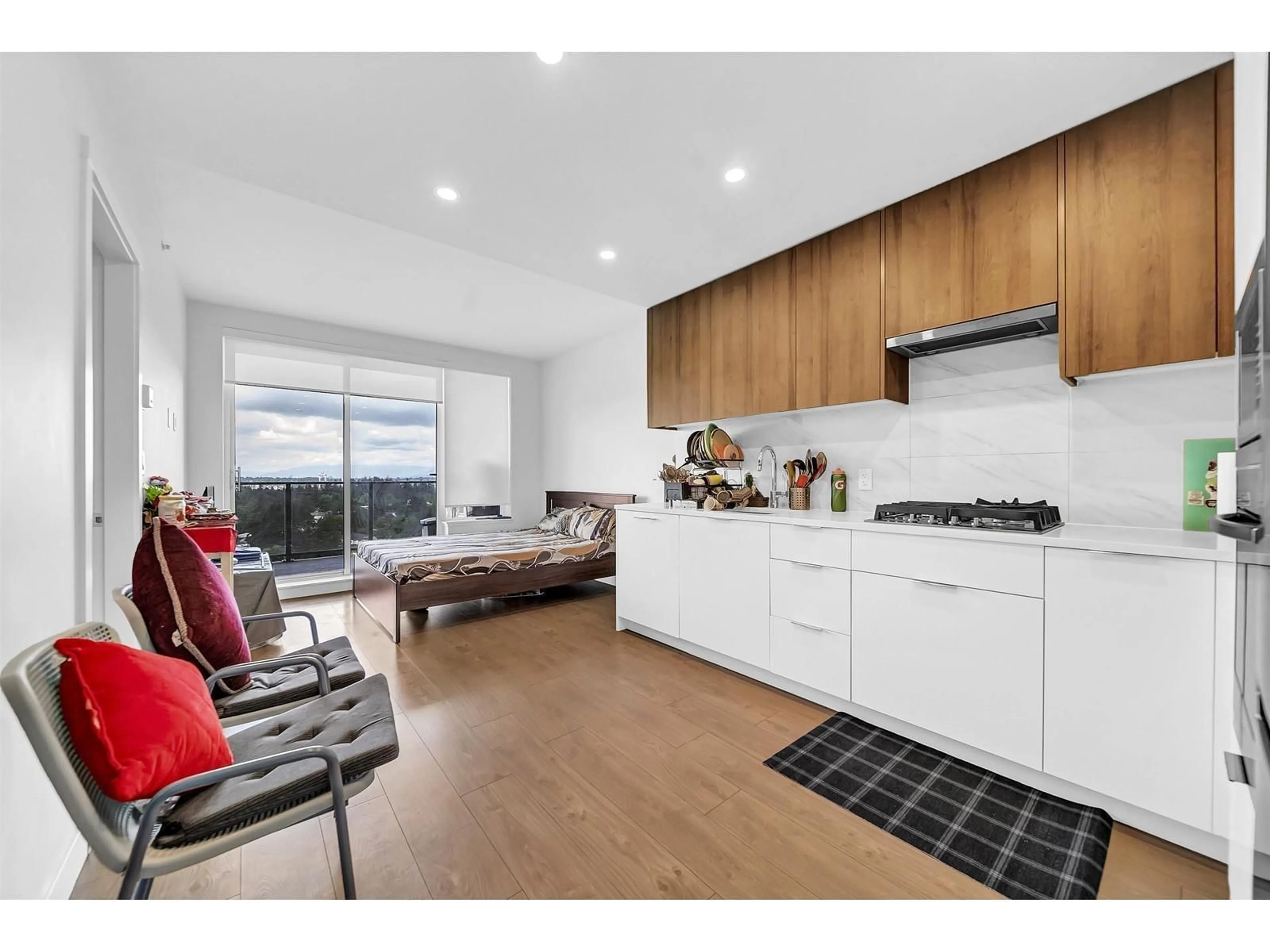 Open concept kitchen, wood/laminate floor for 1408 - 13359 OLD YALE, Surrey British Columbia V3T0S4