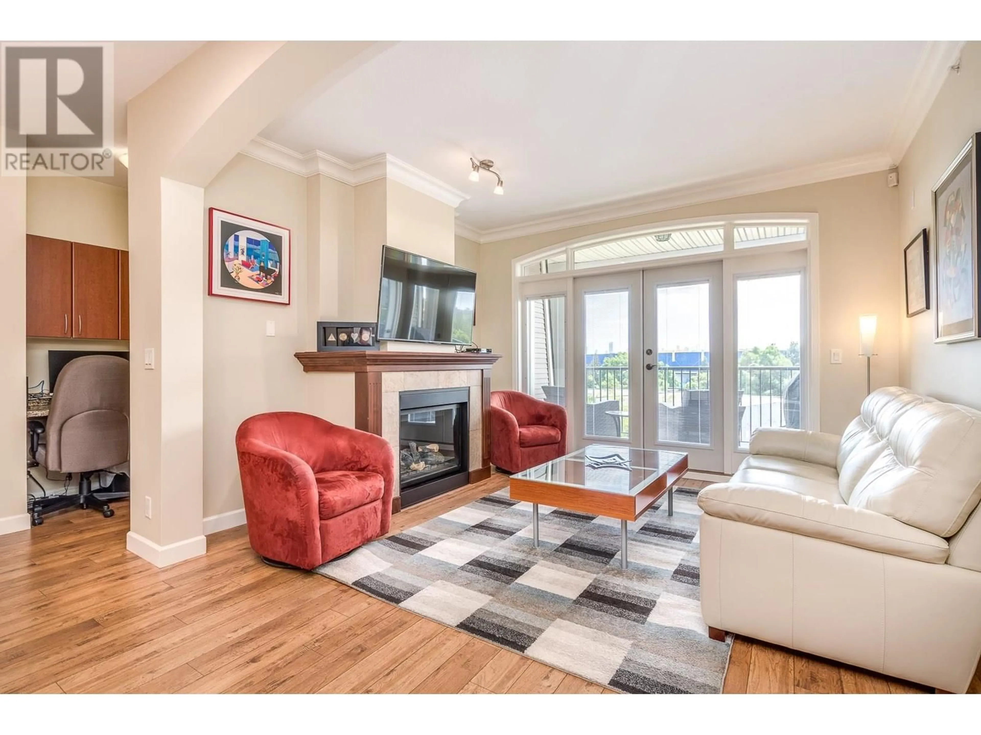 Living room with furniture, wood/laminate floor for 307 - 976 ADAIR AVENUE, Coquitlam British Columbia V3K3V2