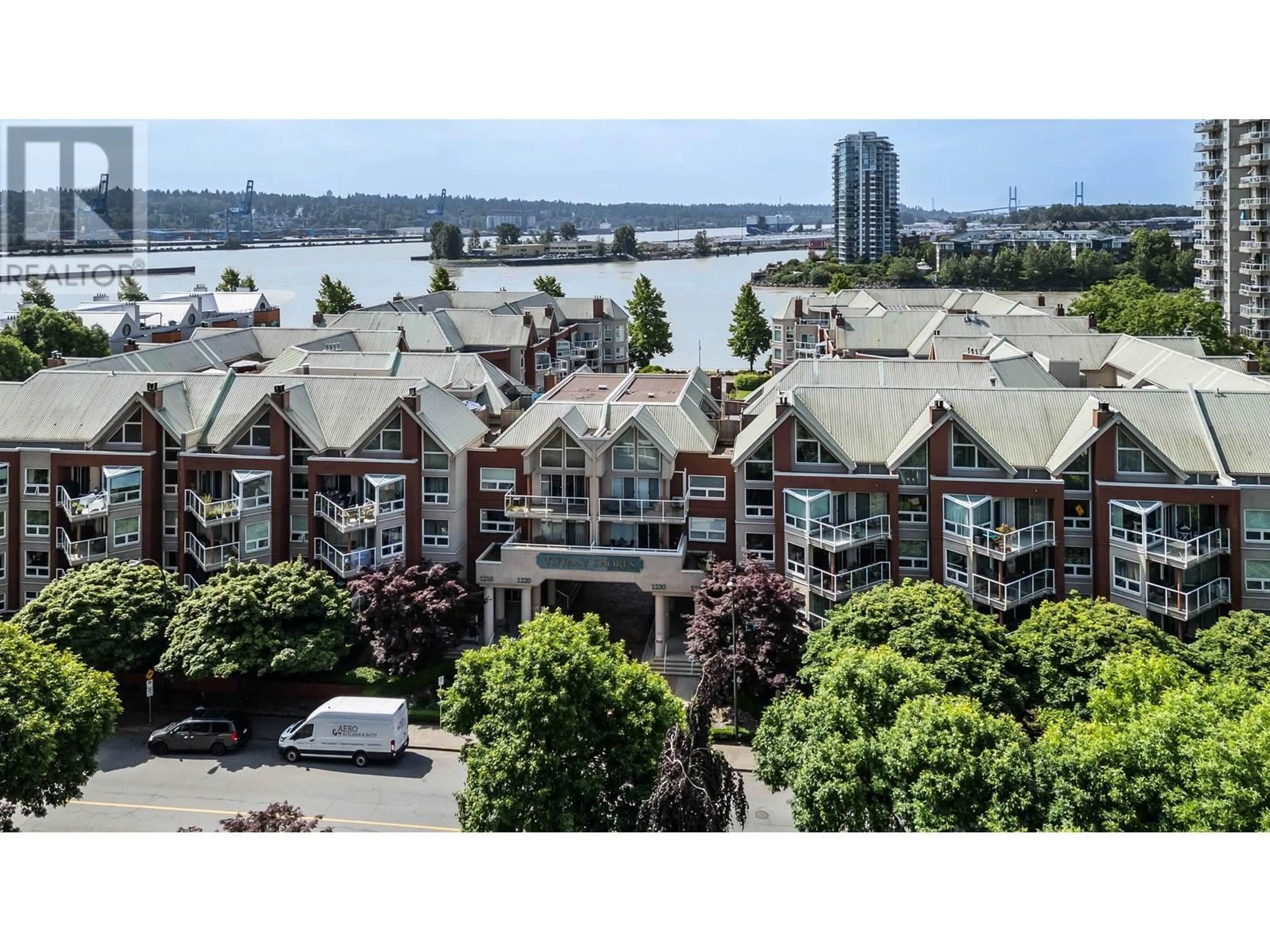 A pic from outside/outdoor area/front of a property/back of a property/a pic from drone, water/lake/river/ocean view for 306 - 1240 QUAYSIDE DRIVE, New Westminster British Columbia V3M6H1