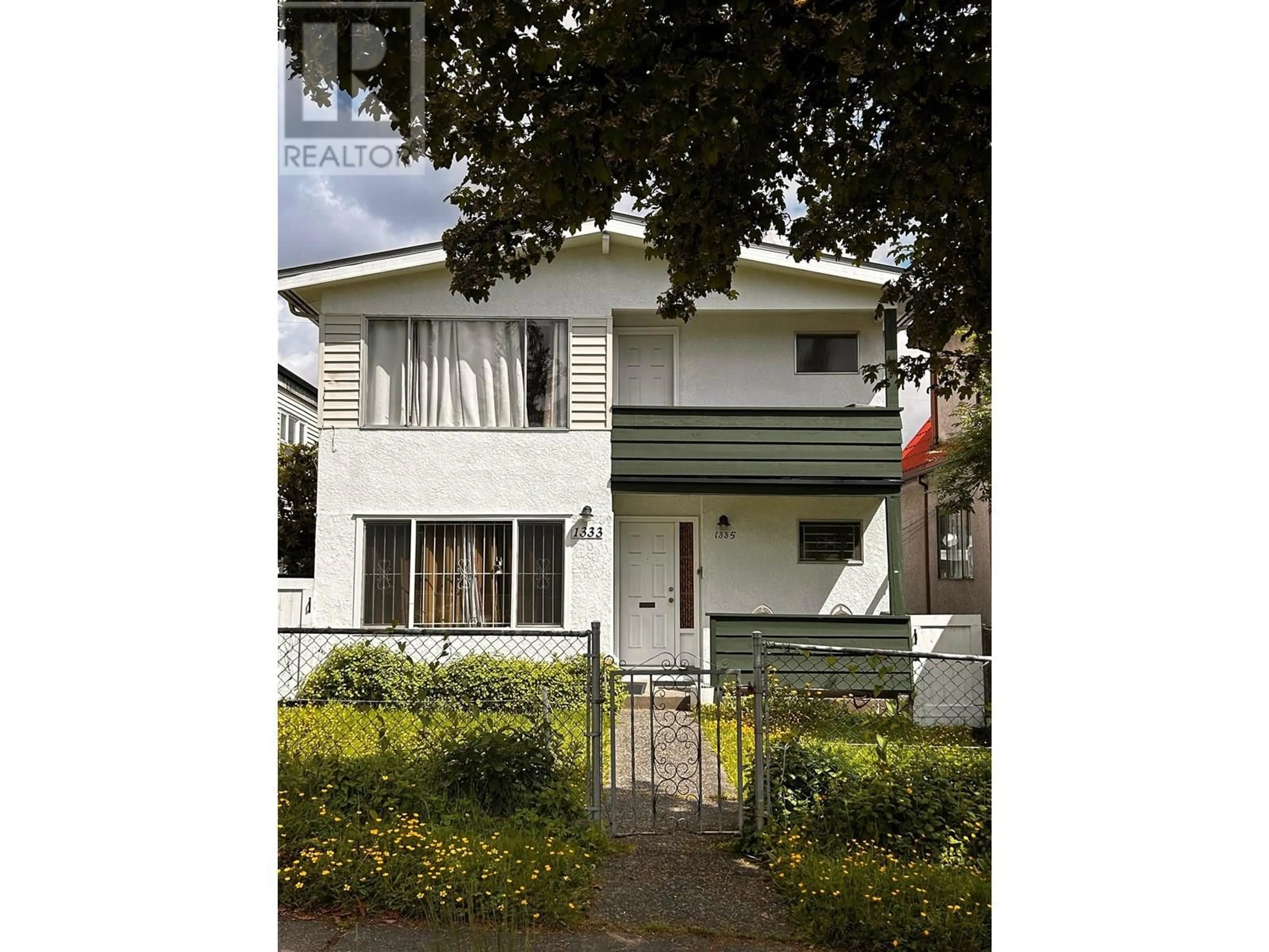 Home with vinyl exterior material, street for 1333 14TH AVENUE, Vancouver British Columbia V5N2C7