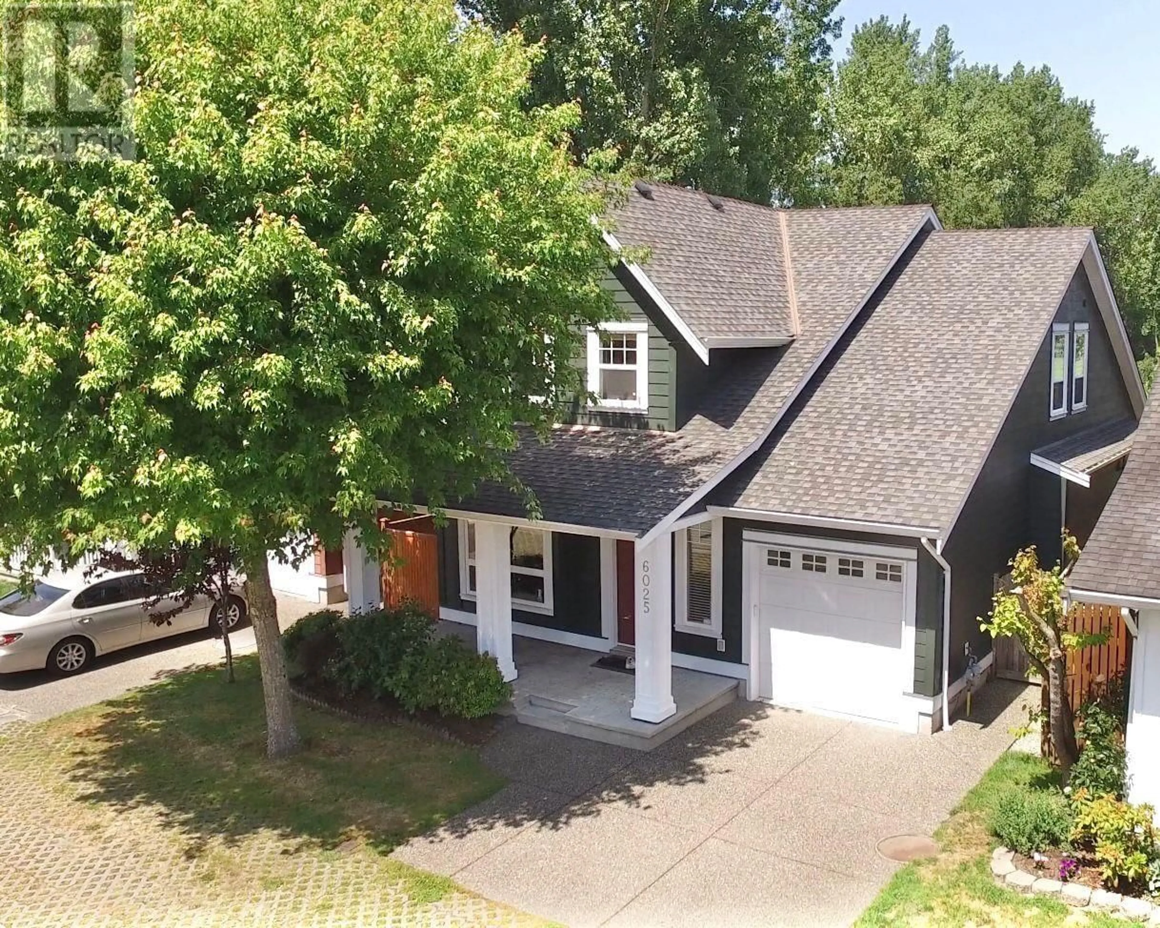 A pic from outside/outdoor area/front of a property/back of a property/a pic from drone, street for 6025 46A AVENUE, Delta British Columbia V4K5G2