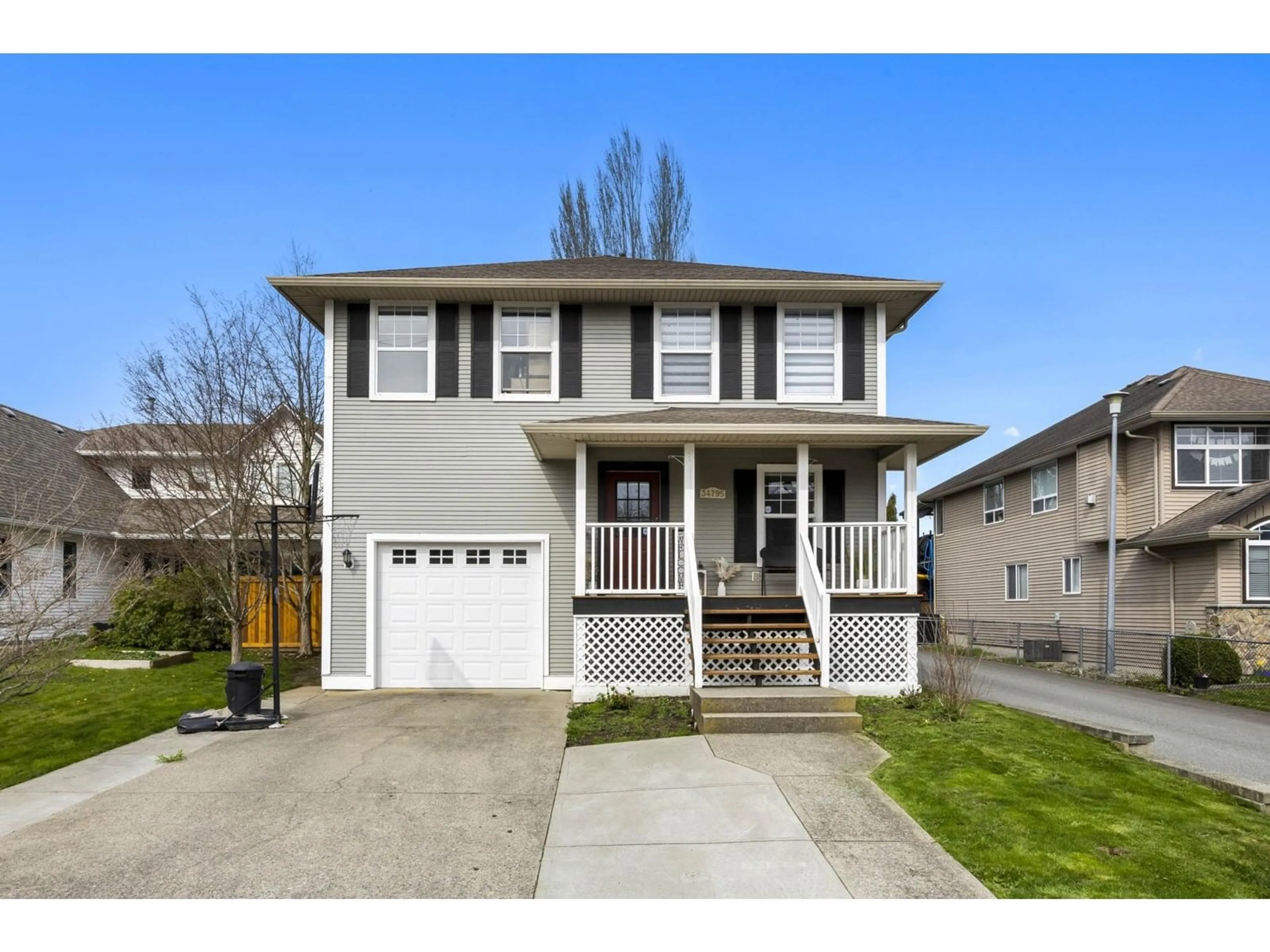 Home with vinyl exterior material, street for 34795 1ST, Abbotsford British Columbia V2S8C2