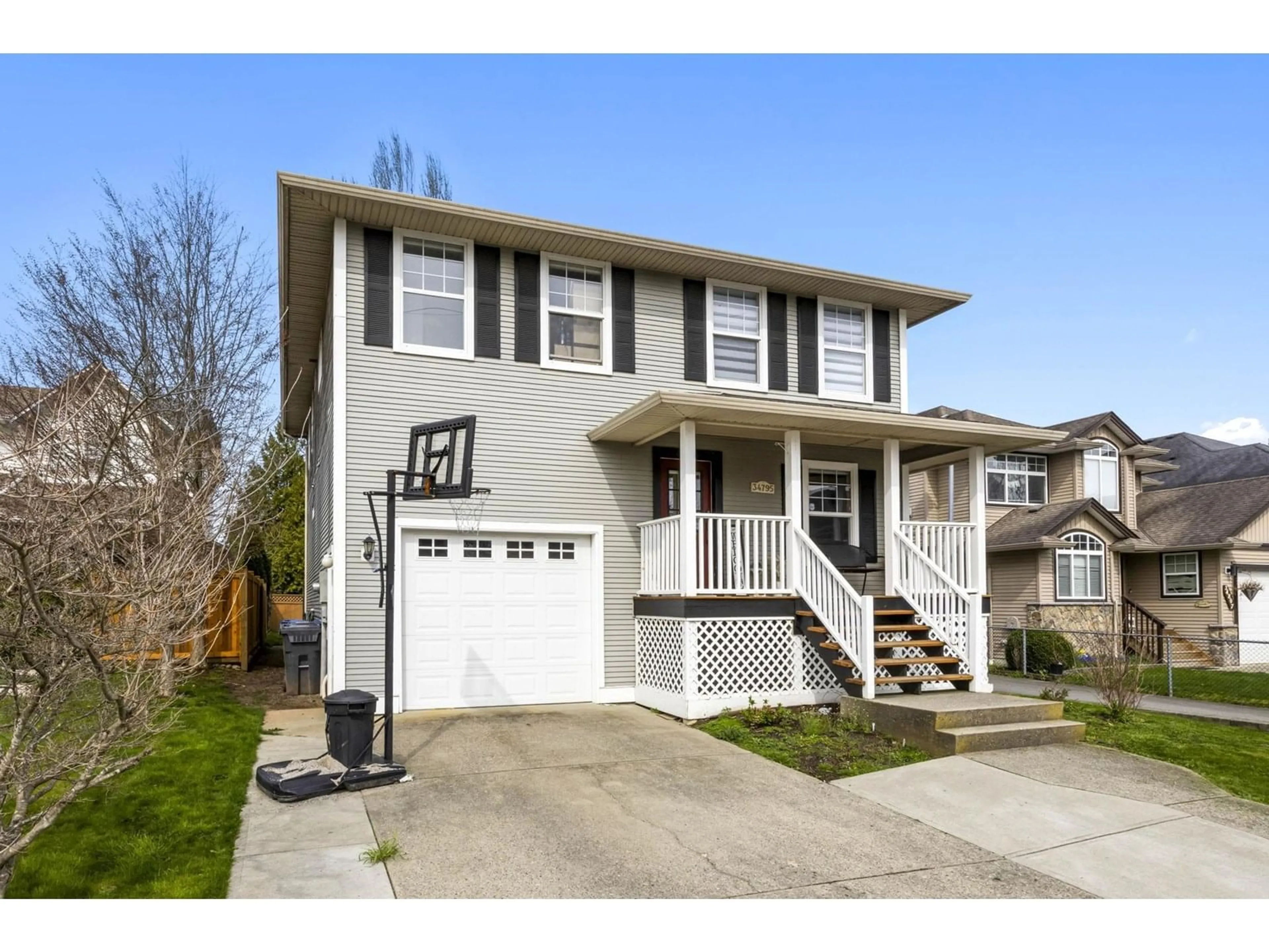 Home with vinyl exterior material, street for 34795 1ST, Abbotsford British Columbia V2S8C2