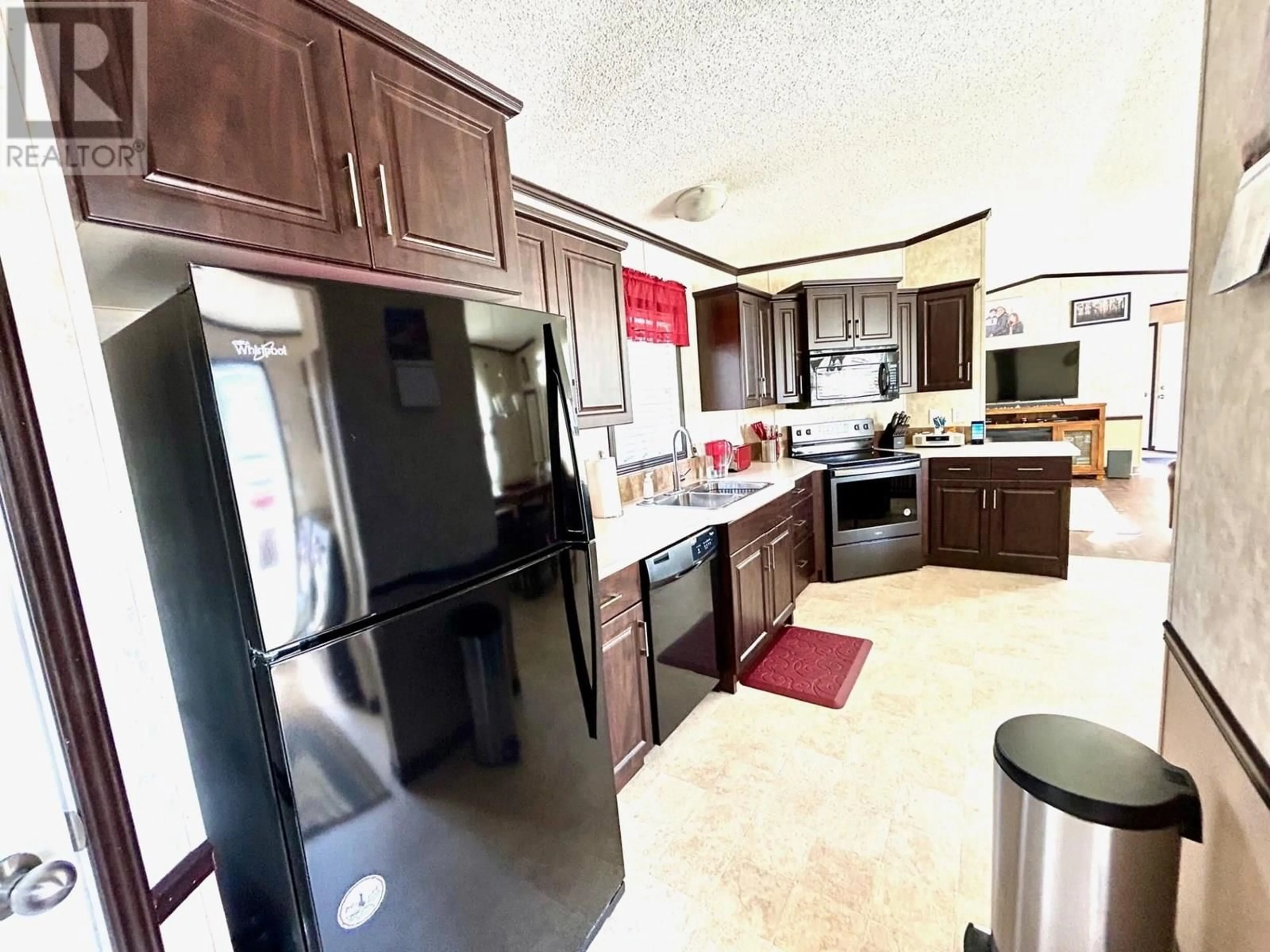 Open concept kitchen, ceramic/tile floor for 5227 42 STREET, Fort Nelson British Columbia V0C1R0