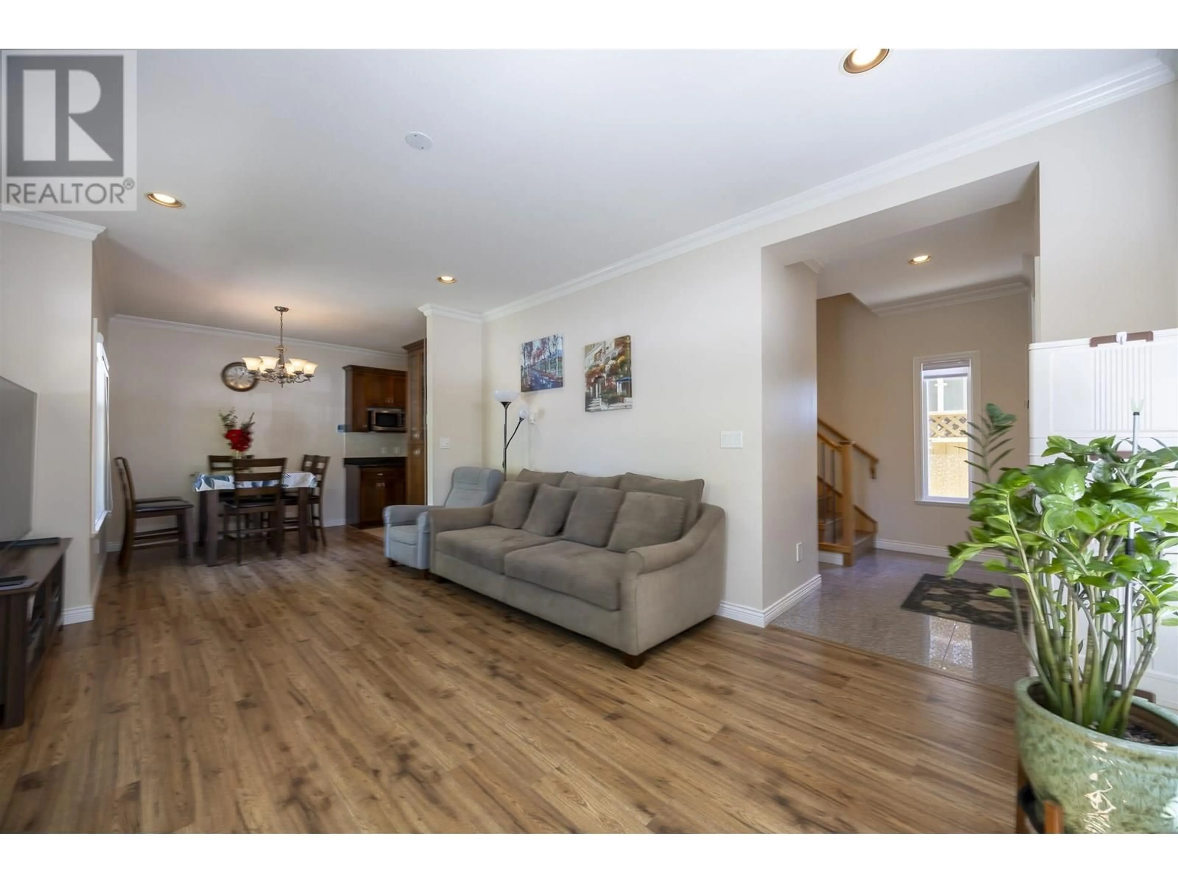 Living room with furniture, wood/laminate floor for 4303 ALBERT STREET, Burnaby British Columbia V5C2E9