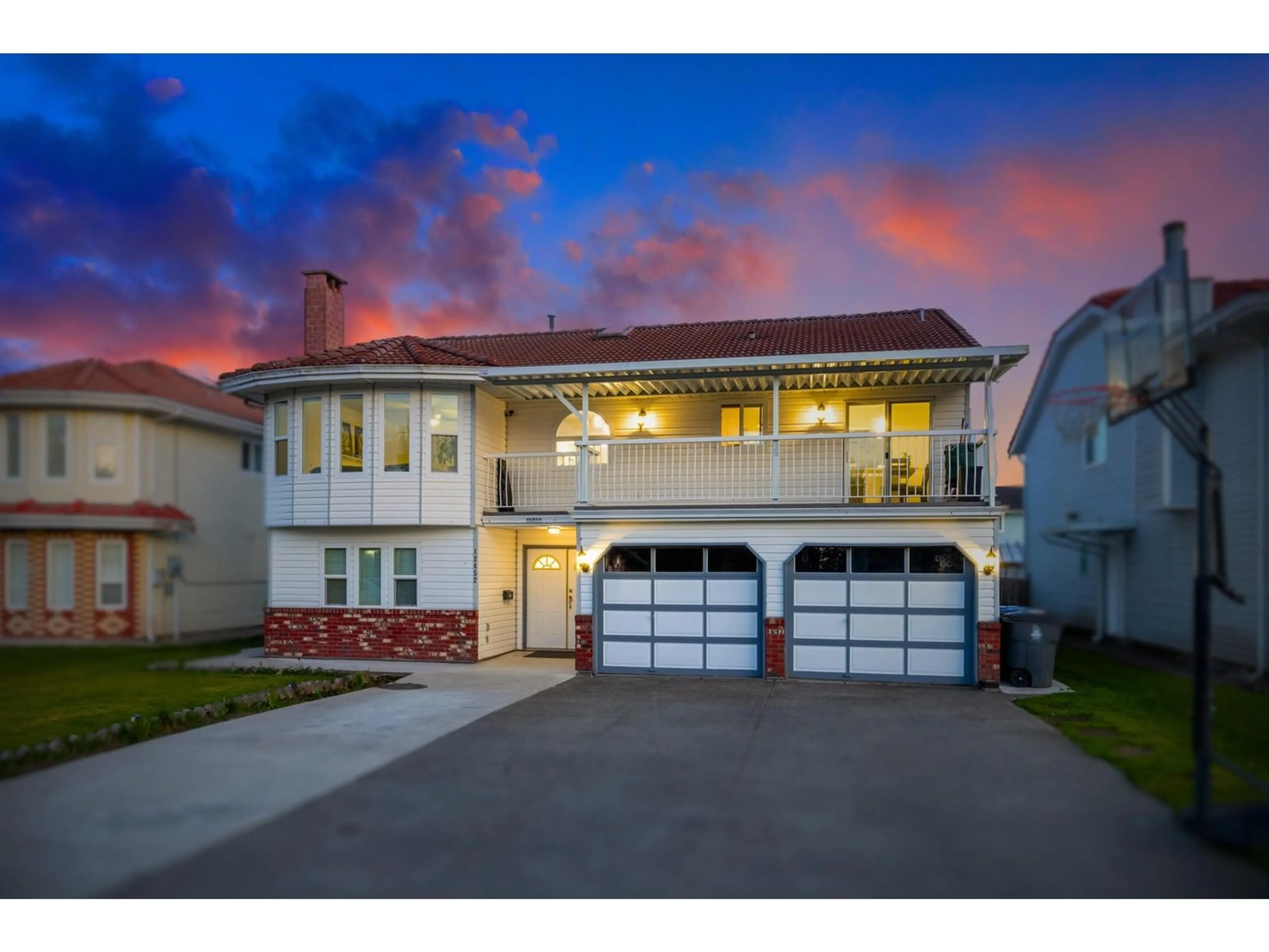 Home with vinyl exterior material, street for 12452 90A, Surrey British Columbia V3V6T3
