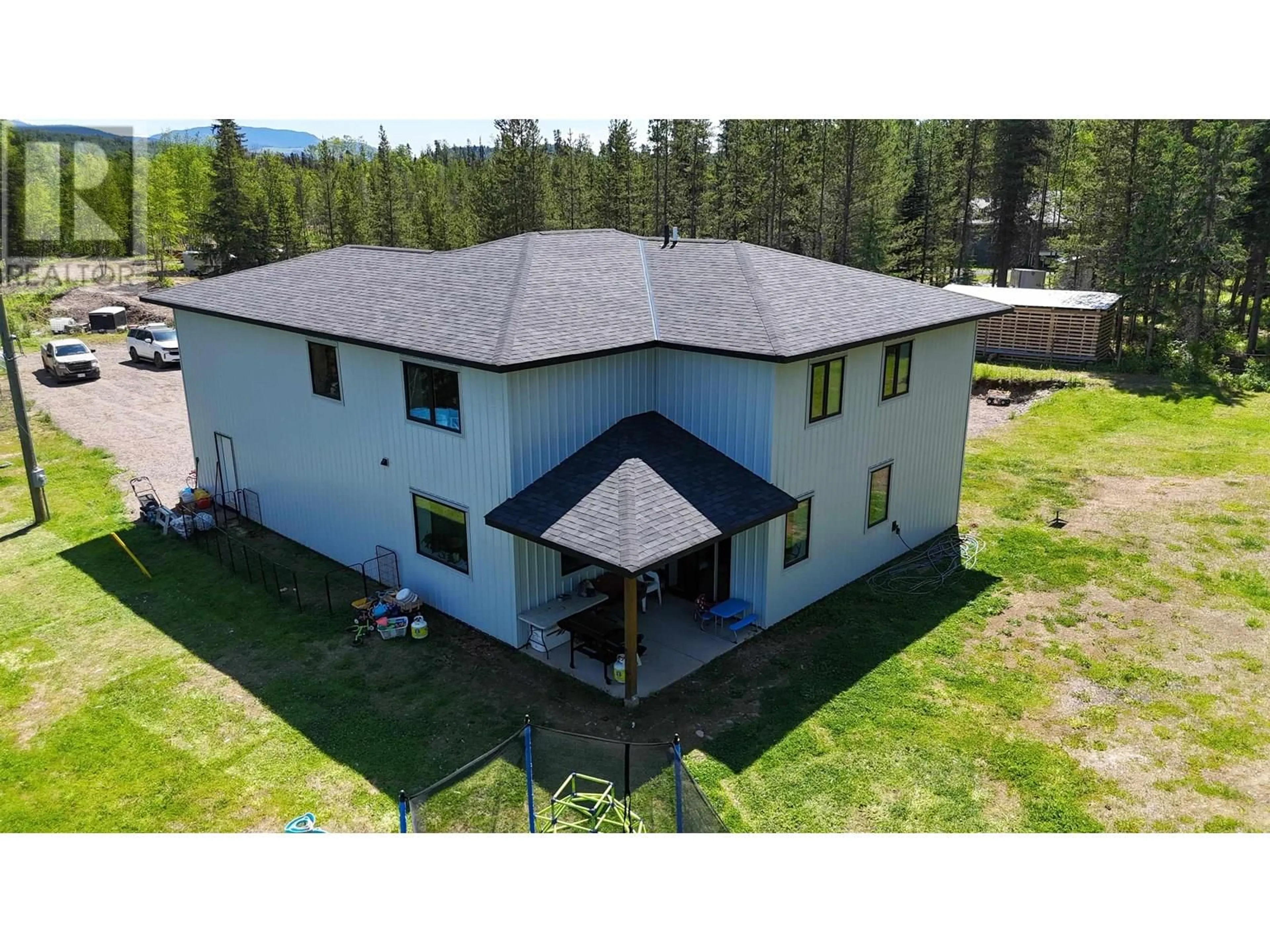 A pic from outside/outdoor area/front of a property/back of a property/a pic from drone, building for 24151 RIVER ROAD, Smithers British Columbia V0J2N1