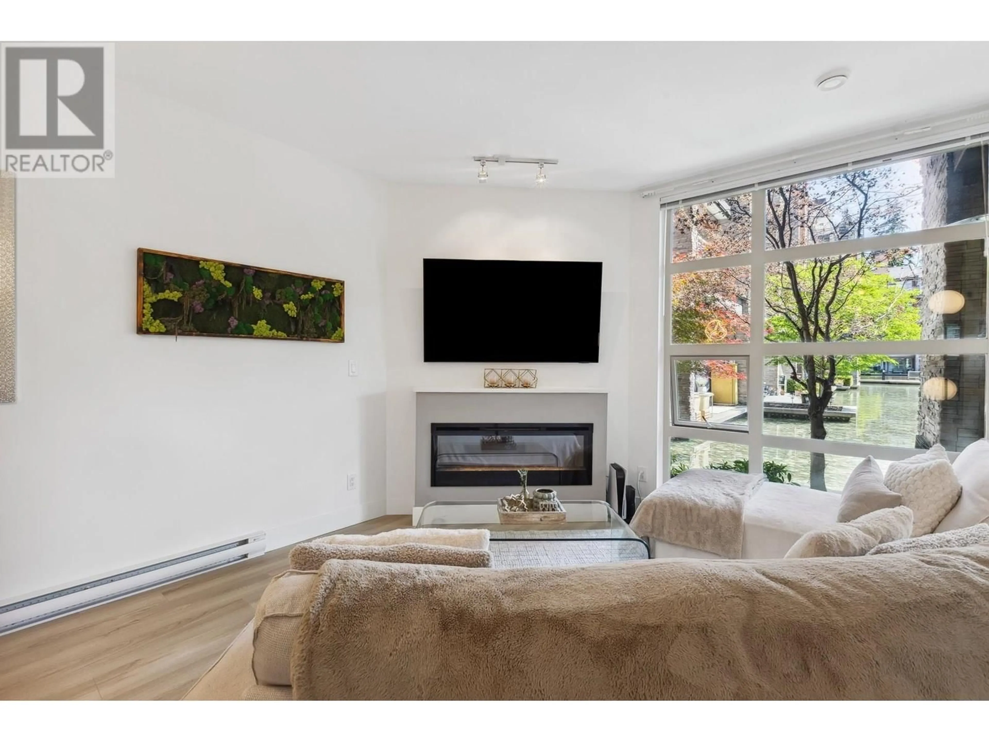 Living room with furniture, unknown for 107 - 3602 ALDERCREST DRIVE, North Vancouver British Columbia V7G0A2