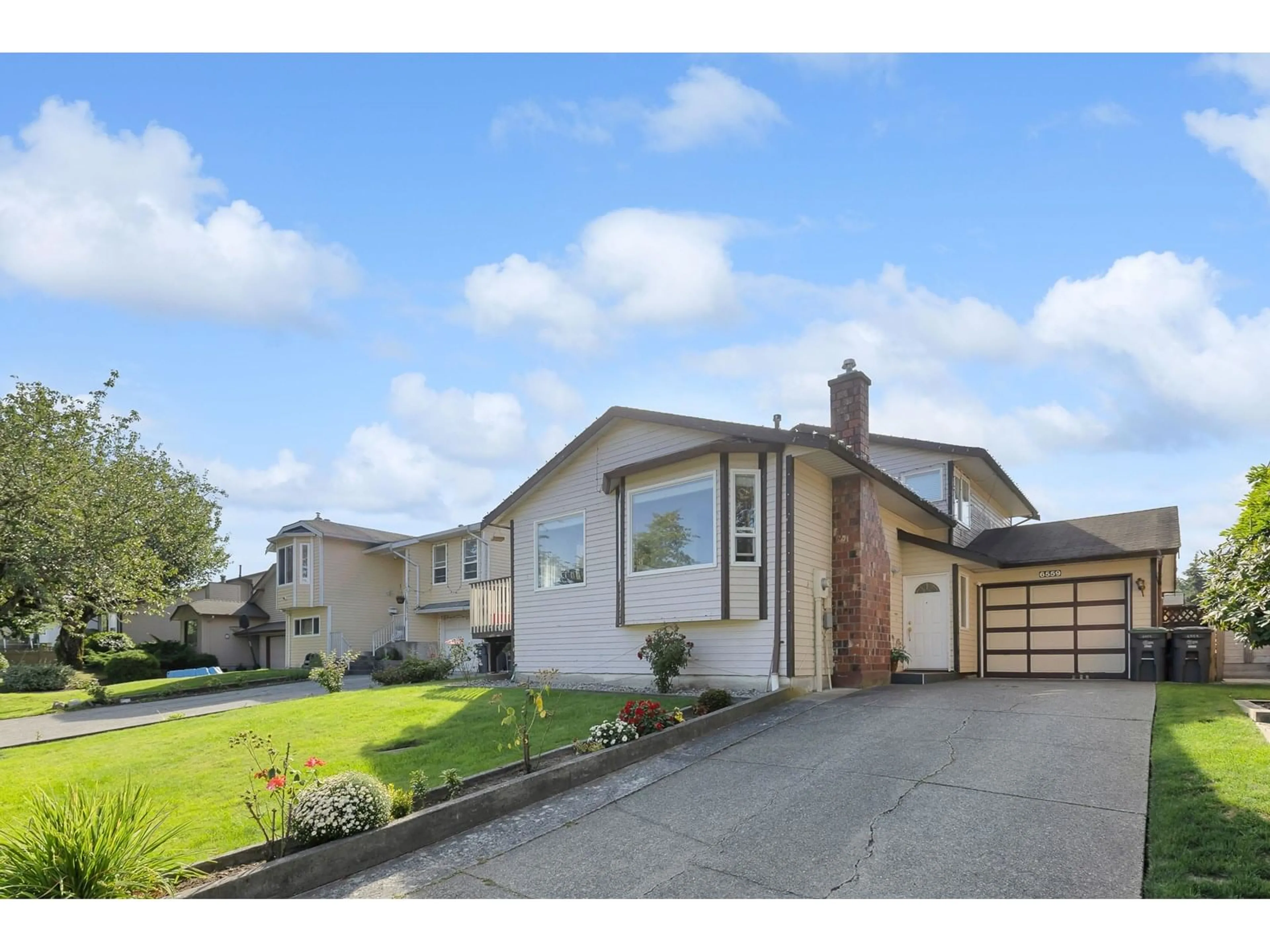 Home with vinyl exterior material, street for 6559 131, Surrey British Columbia V3W8G3