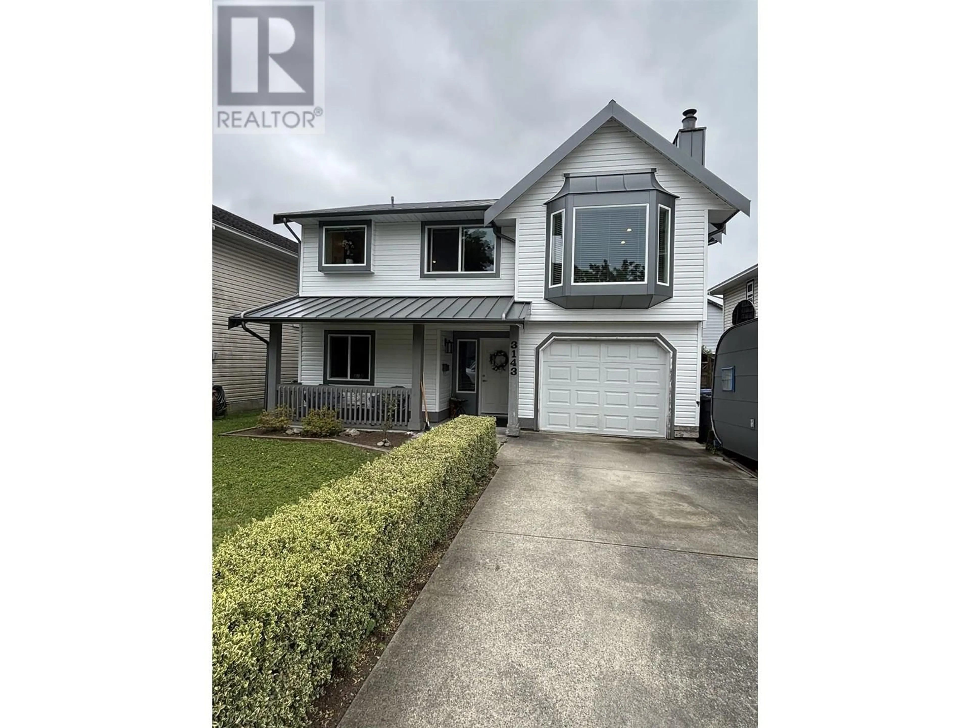 Home with vinyl exterior material, street for 3143 RAE STREET, Port Coquitlam British Columbia V3B2Y3