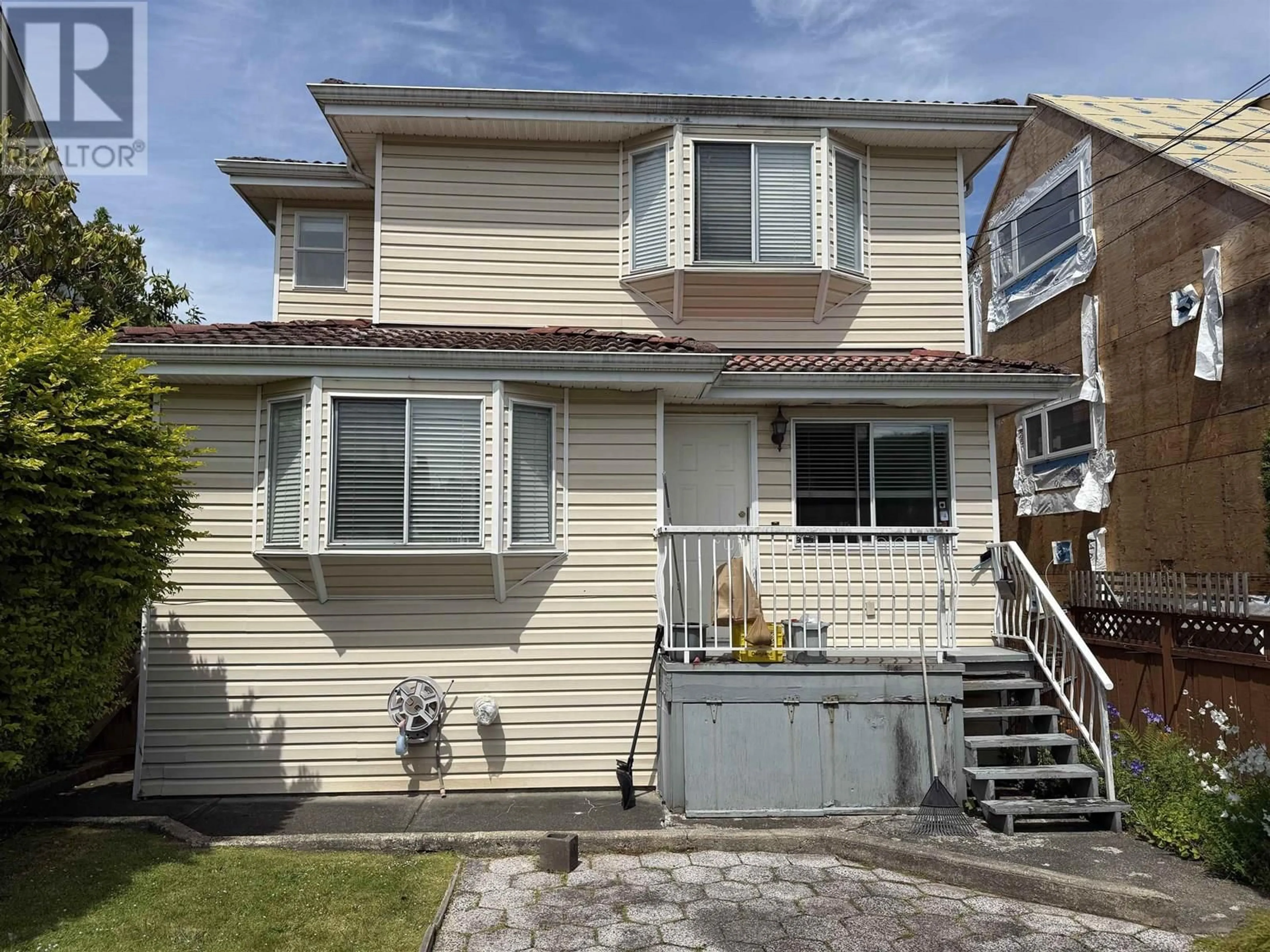 Home with vinyl exterior material, street for 2788 CAMBRIDGE STREET, Vancouver British Columbia V5K1L7