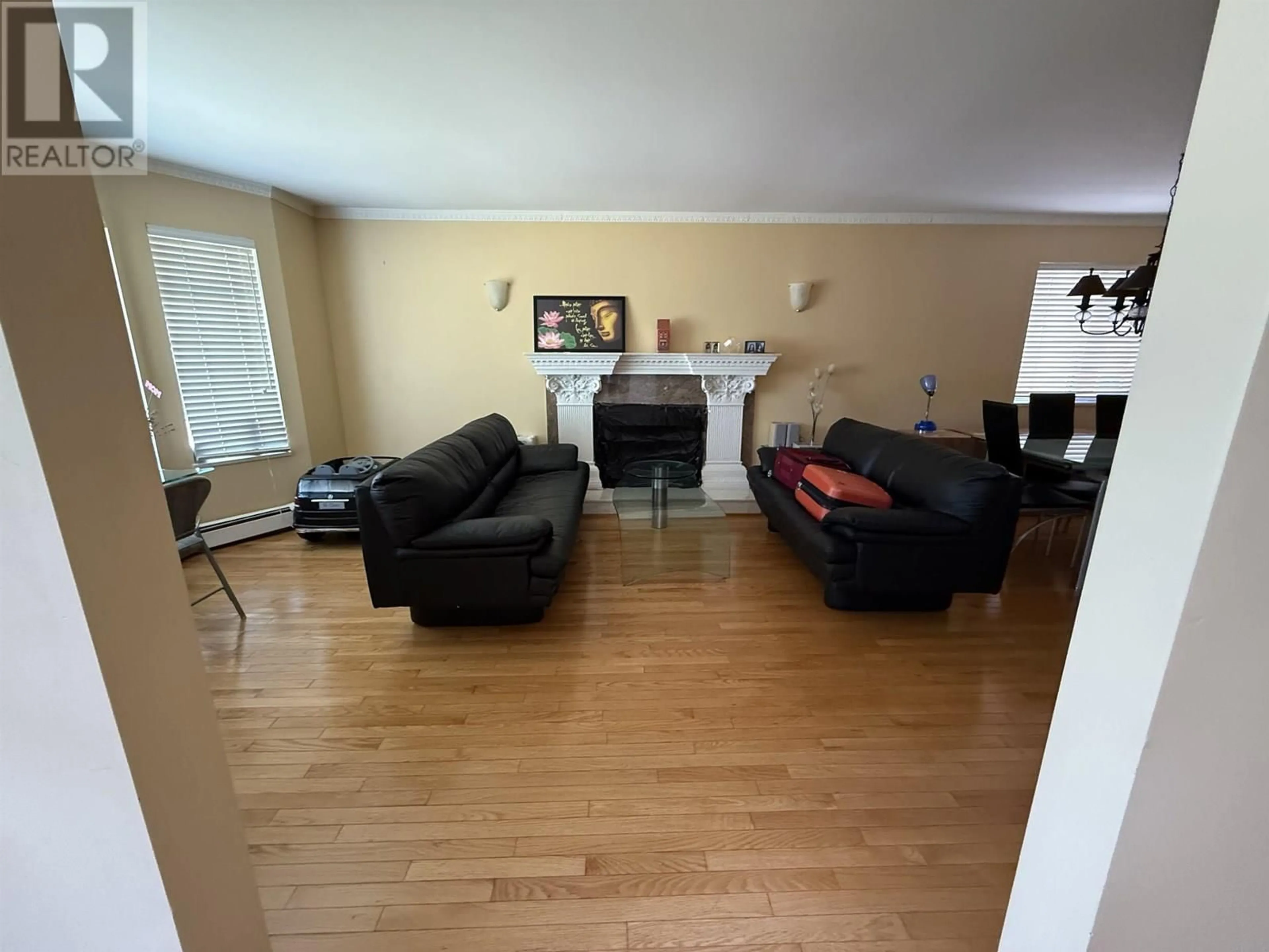 Living room with furniture, wood/laminate floor for 2788 CAMBRIDGE STREET, Vancouver British Columbia V5K1L7