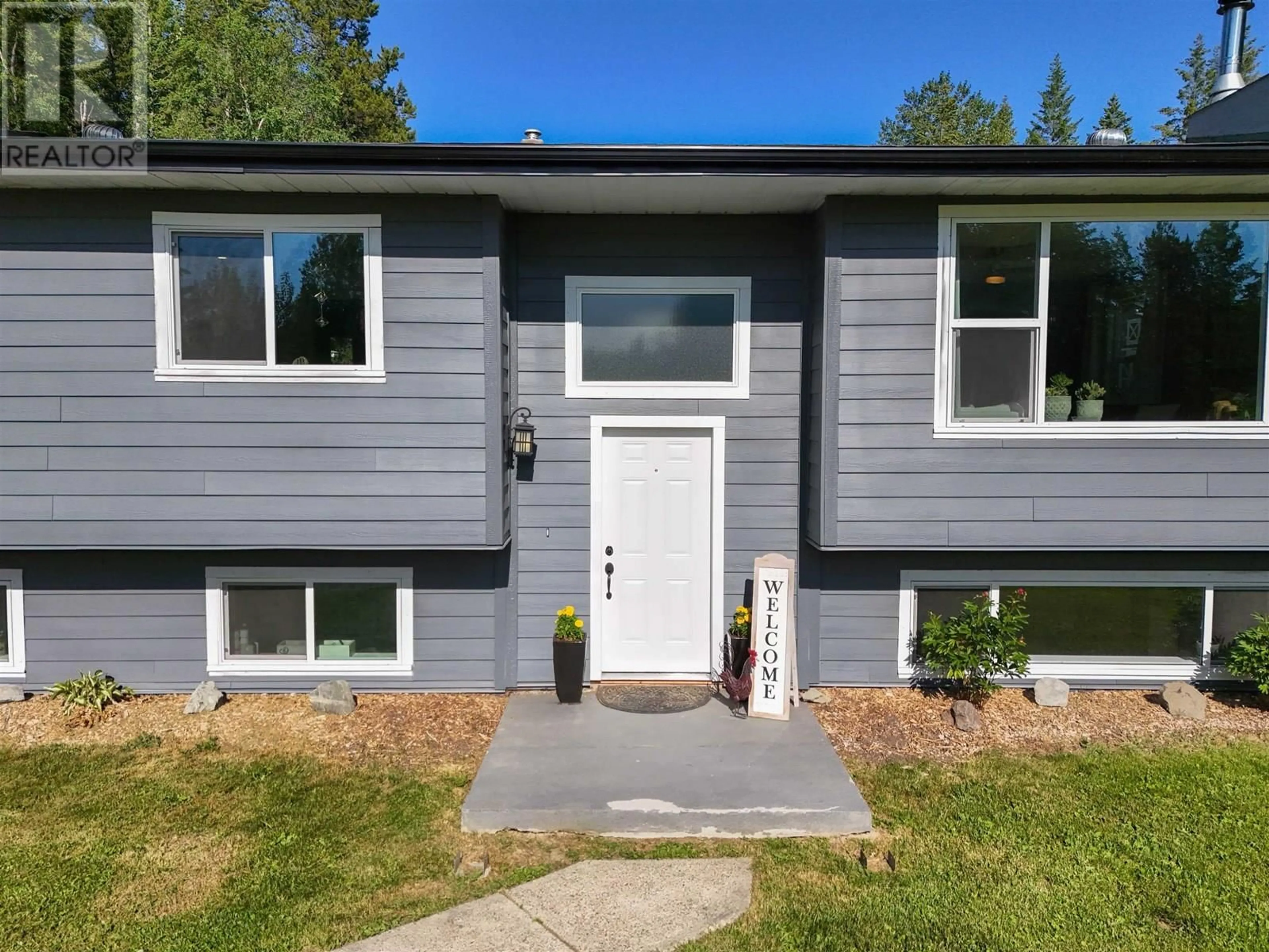 Home with vinyl exterior material, street for 2827 RED BLUFF ROAD, Red Bluff / Dragon Lake British Columbia V2J6C4