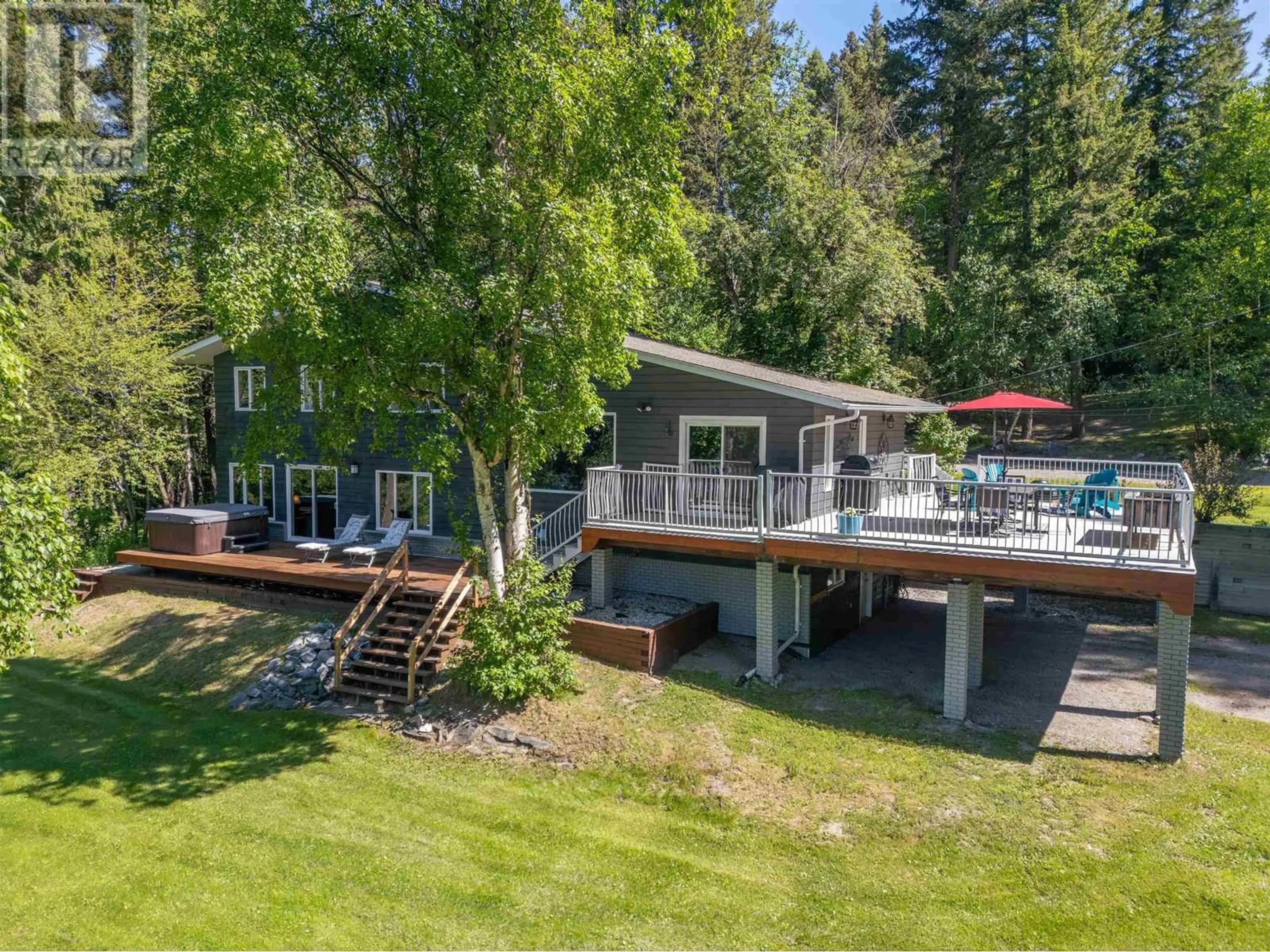A pic from outside/outdoor area/front of a property/back of a property/a pic from drone, water/lake/river/ocean view for 21665 WEST LAKE ROAD, Prince George British Columbia V2N6H5