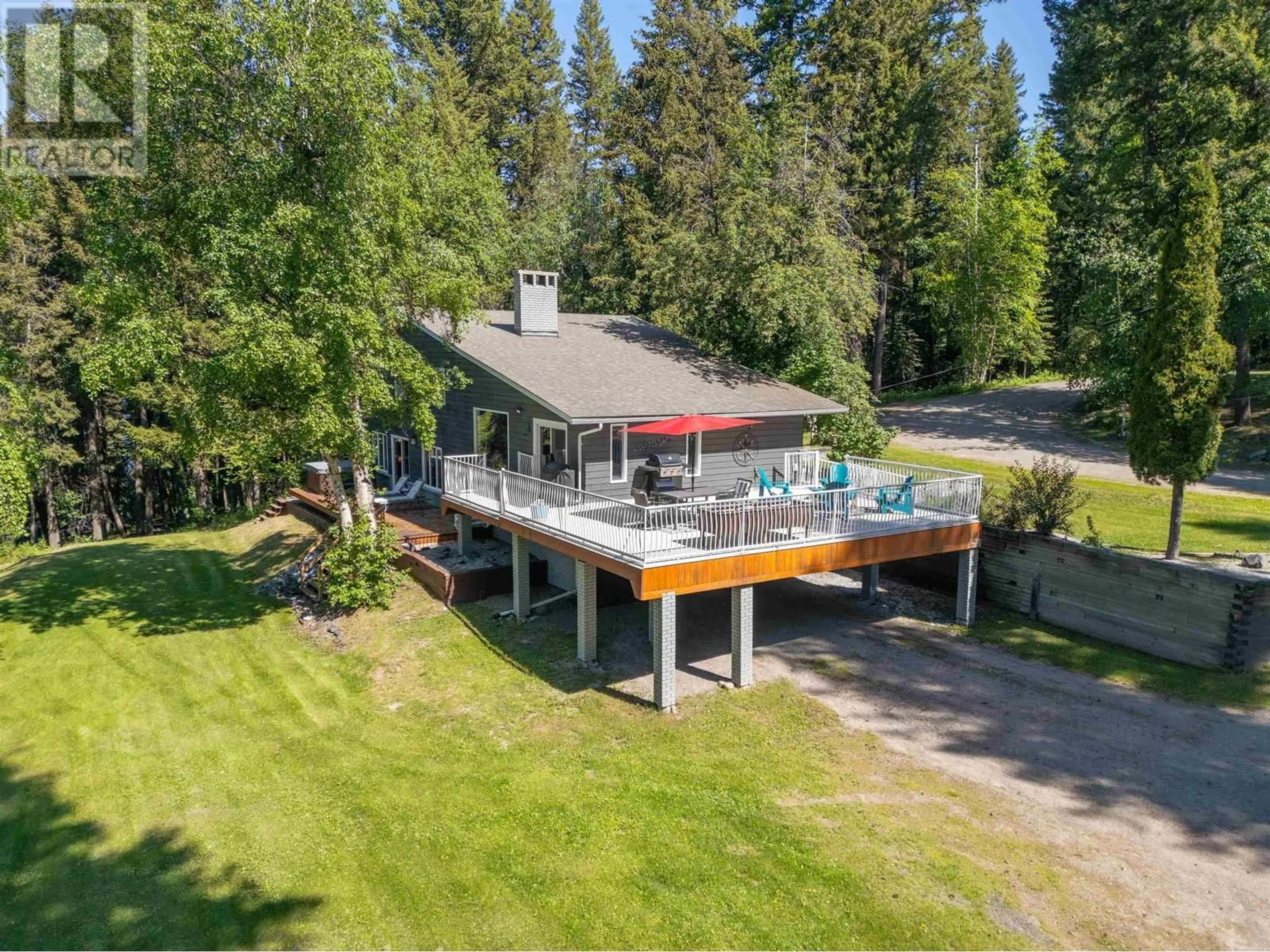 A pic from outside/outdoor area/front of a property/back of a property/a pic from drone, water/lake/river/ocean view for 21665 WEST LAKE ROAD, Prince George British Columbia V2N6H5