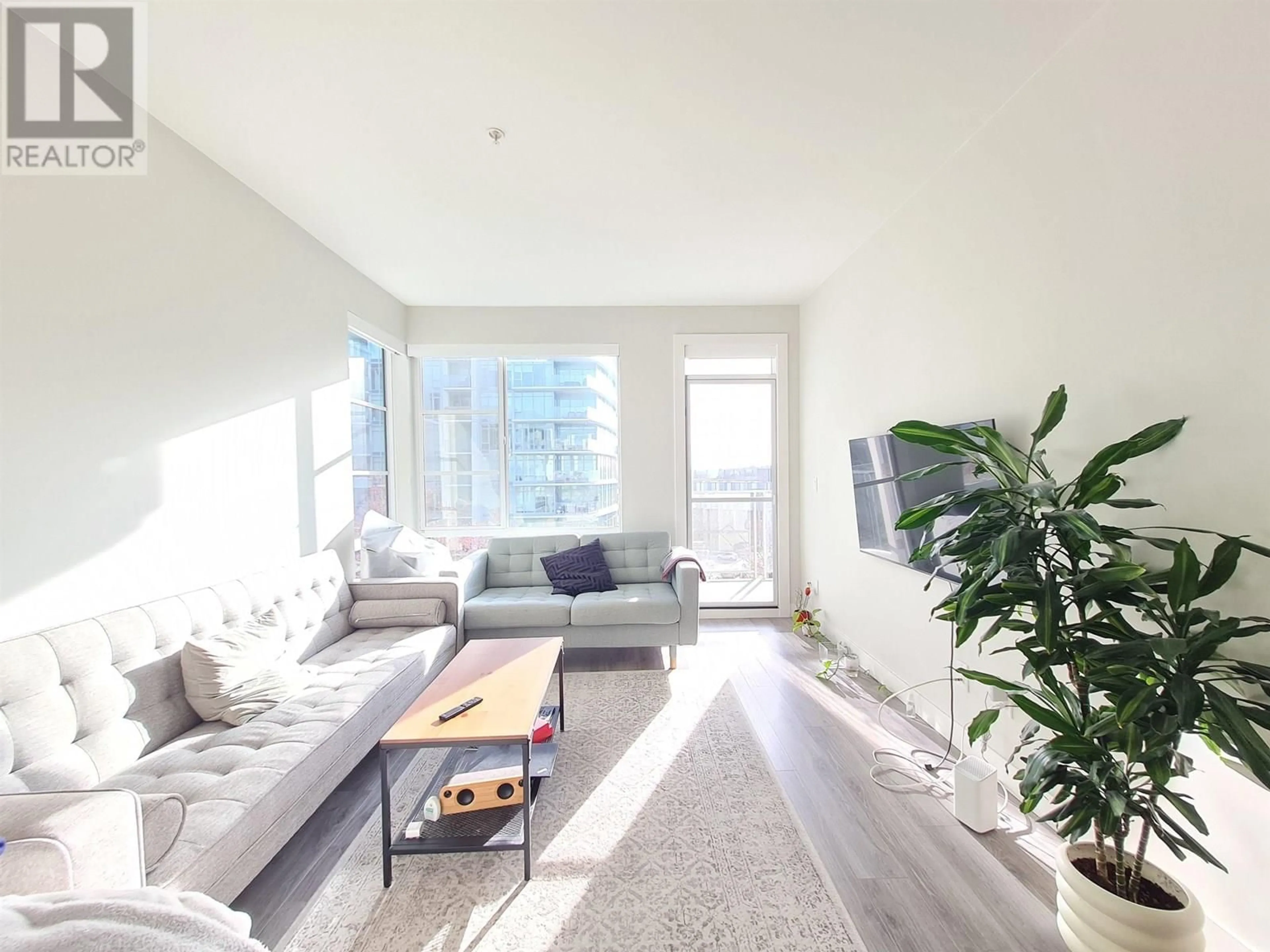 Living room with furniture, unknown for 205 - 1768 GILMORE AVENUE, Burnaby British Columbia V5C0L4