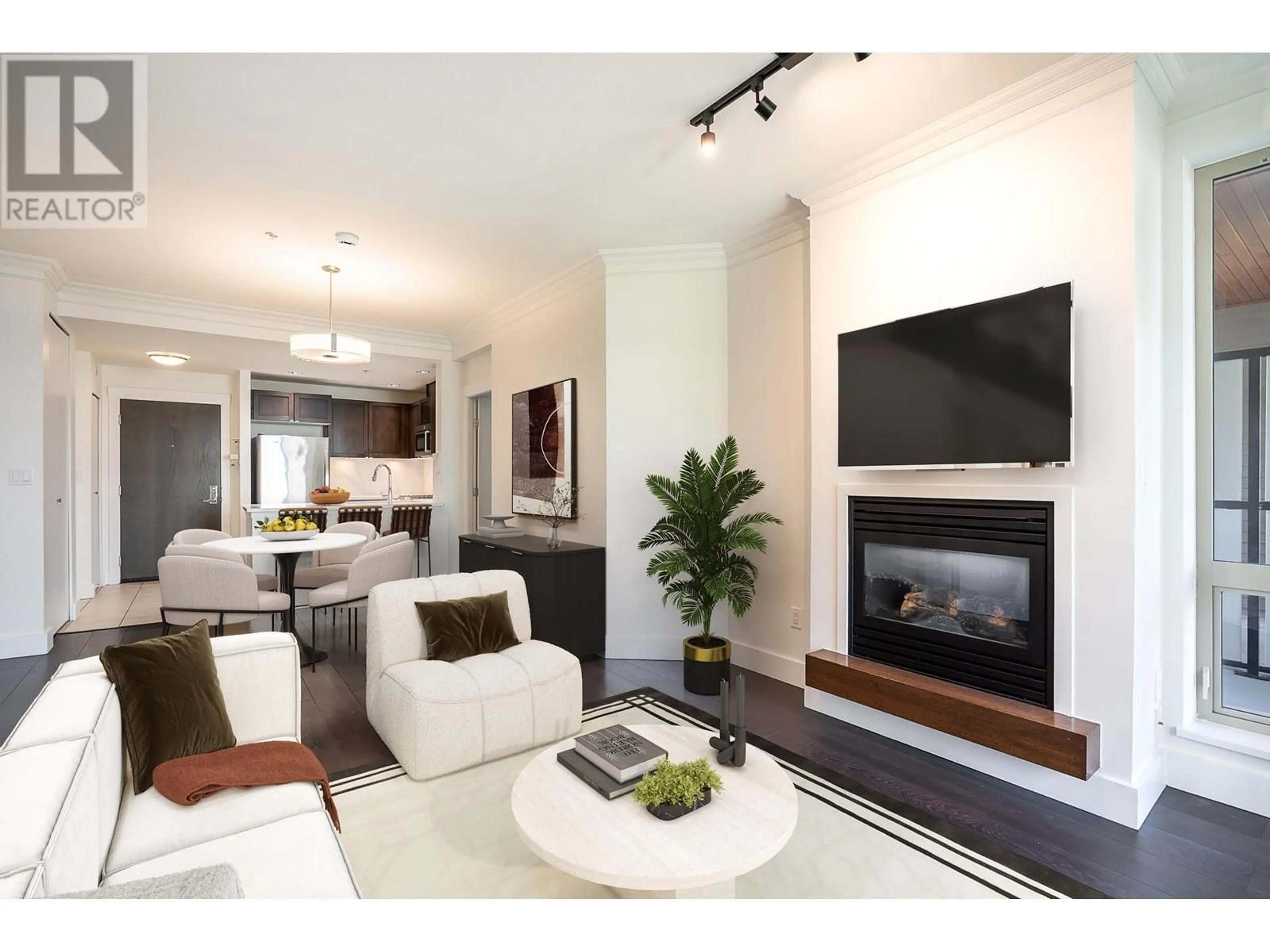 Living room with furniture, wood/laminate floor for 315 - 5777 BIRNEY AVENUE, Vancouver British Columbia V6S0A4