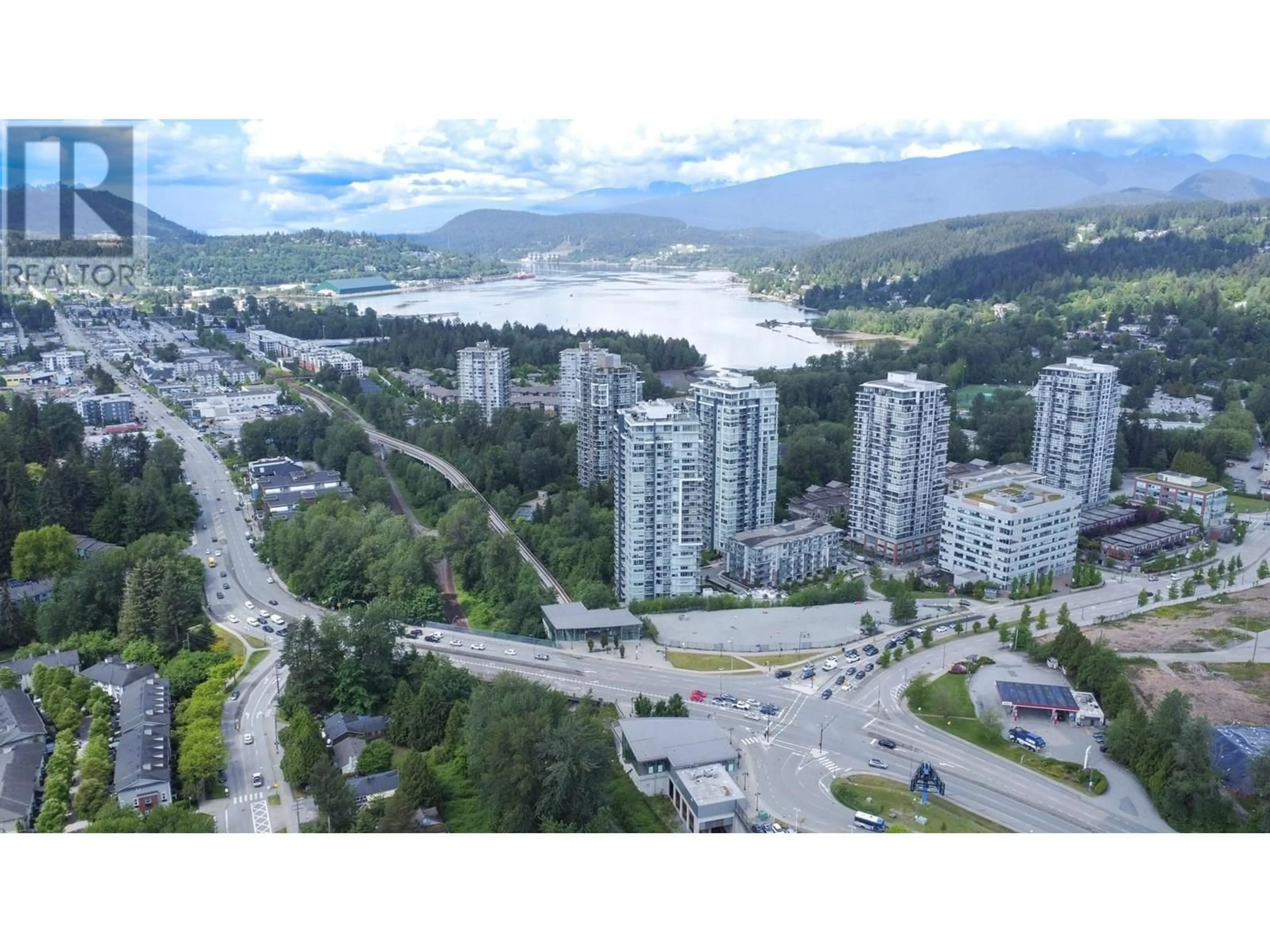 A pic from outside/outdoor area/front of a property/back of a property/a pic from drone, mountain view for 1004 - 308 MORRISSEY ROAD, Port Moody British Columbia V3H0M2
